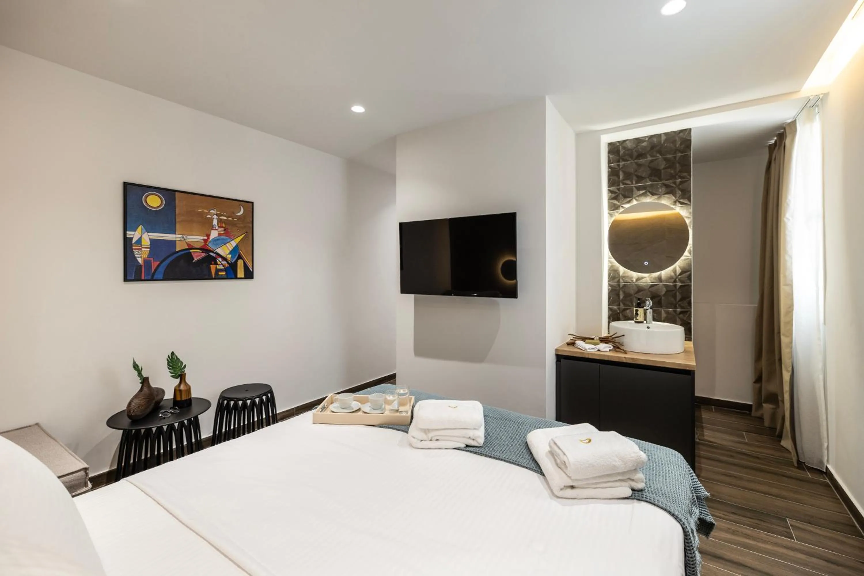 Bed in DOMIOS Suites Athens