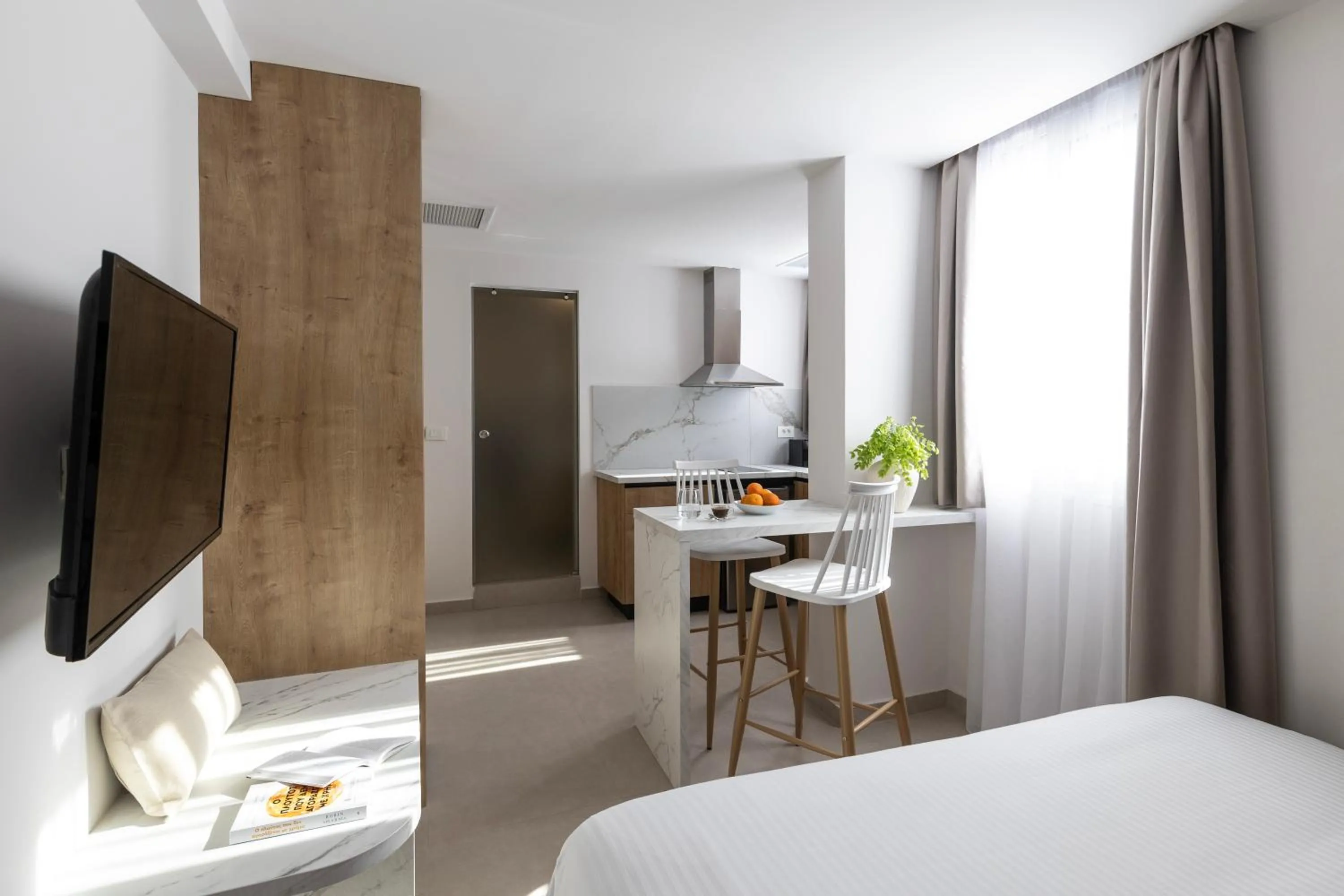 Bed in DOMIOS Suites Athens