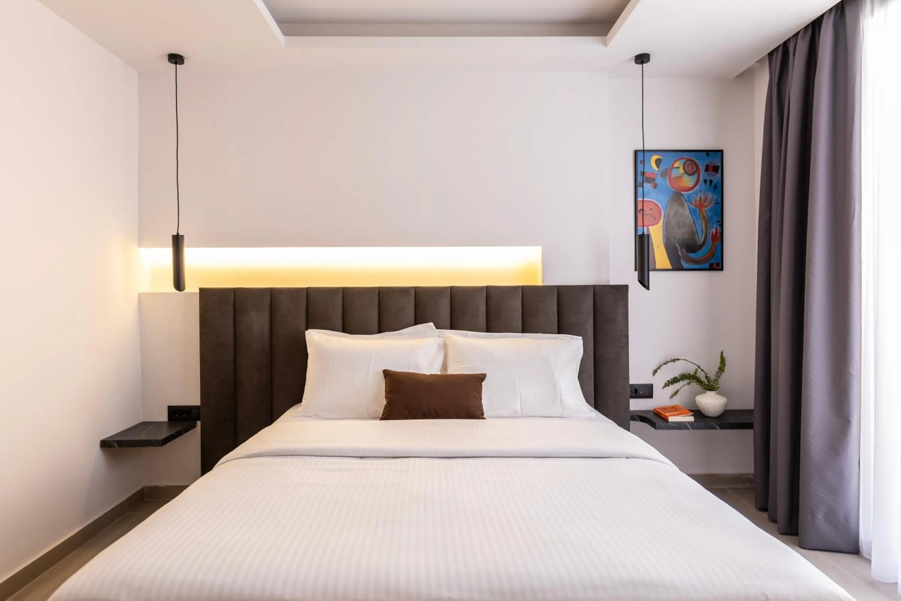Bed in DOMIOS Suites Athens