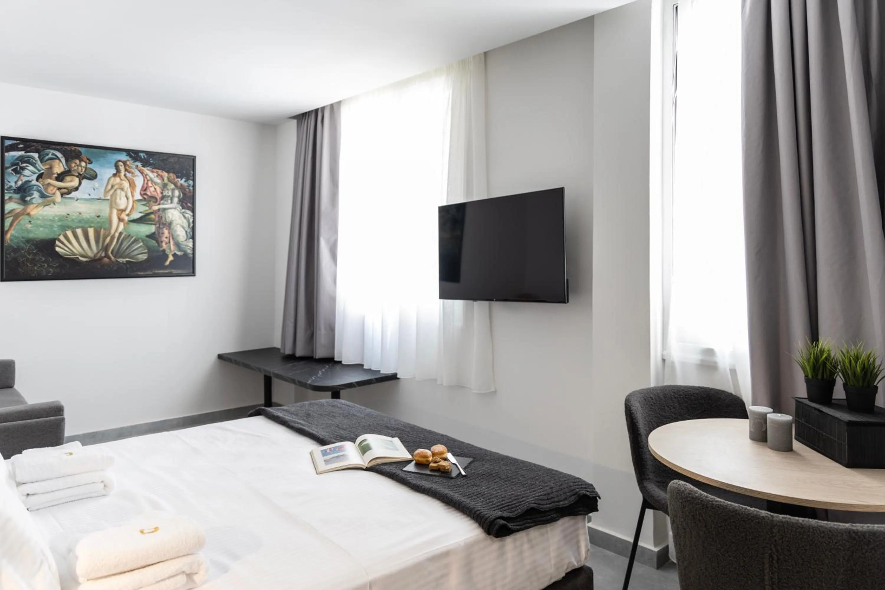 Bed in DOMIOS Suites Athens