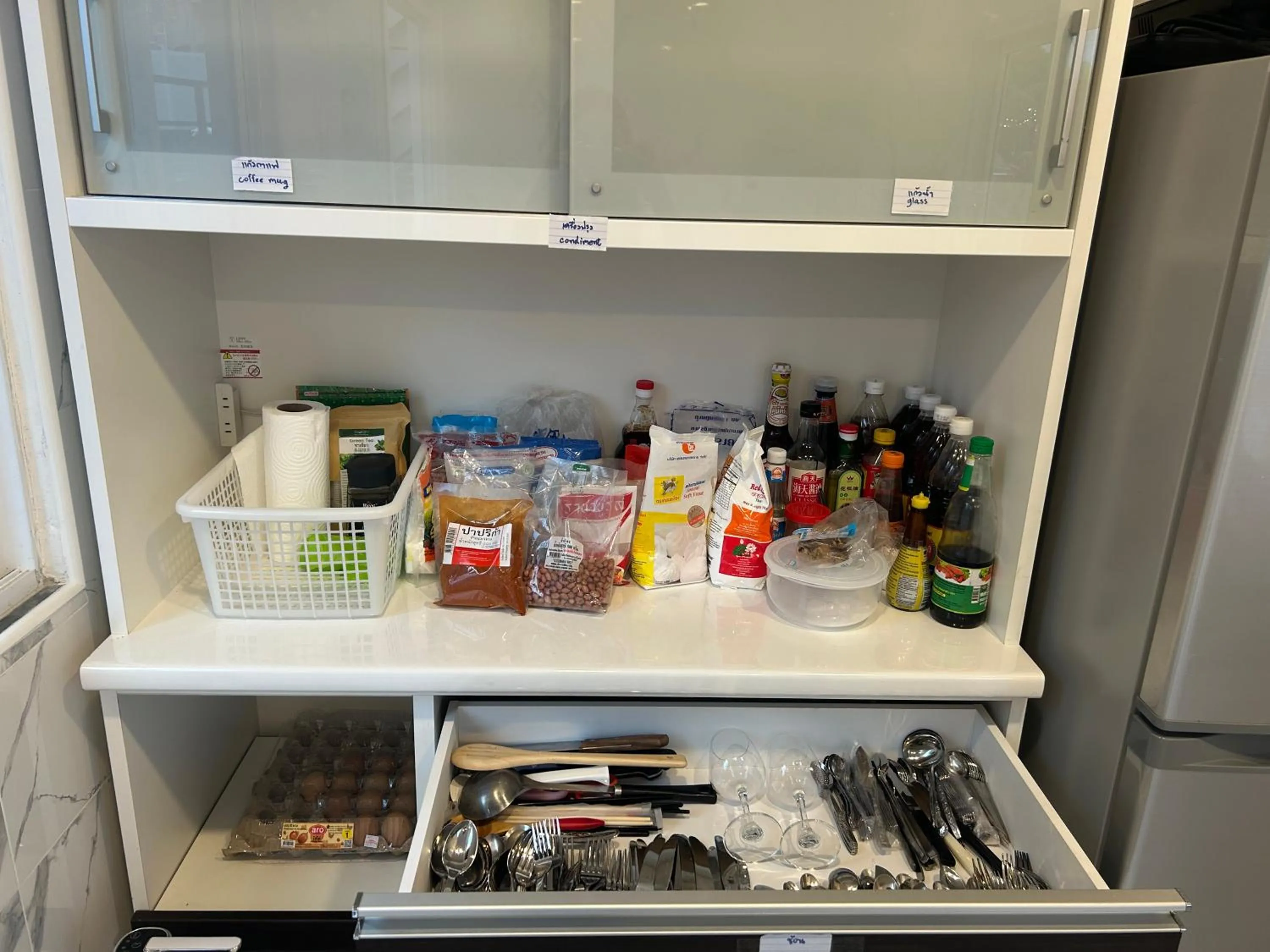 Communal kitchen in Space House Hotel Phuket