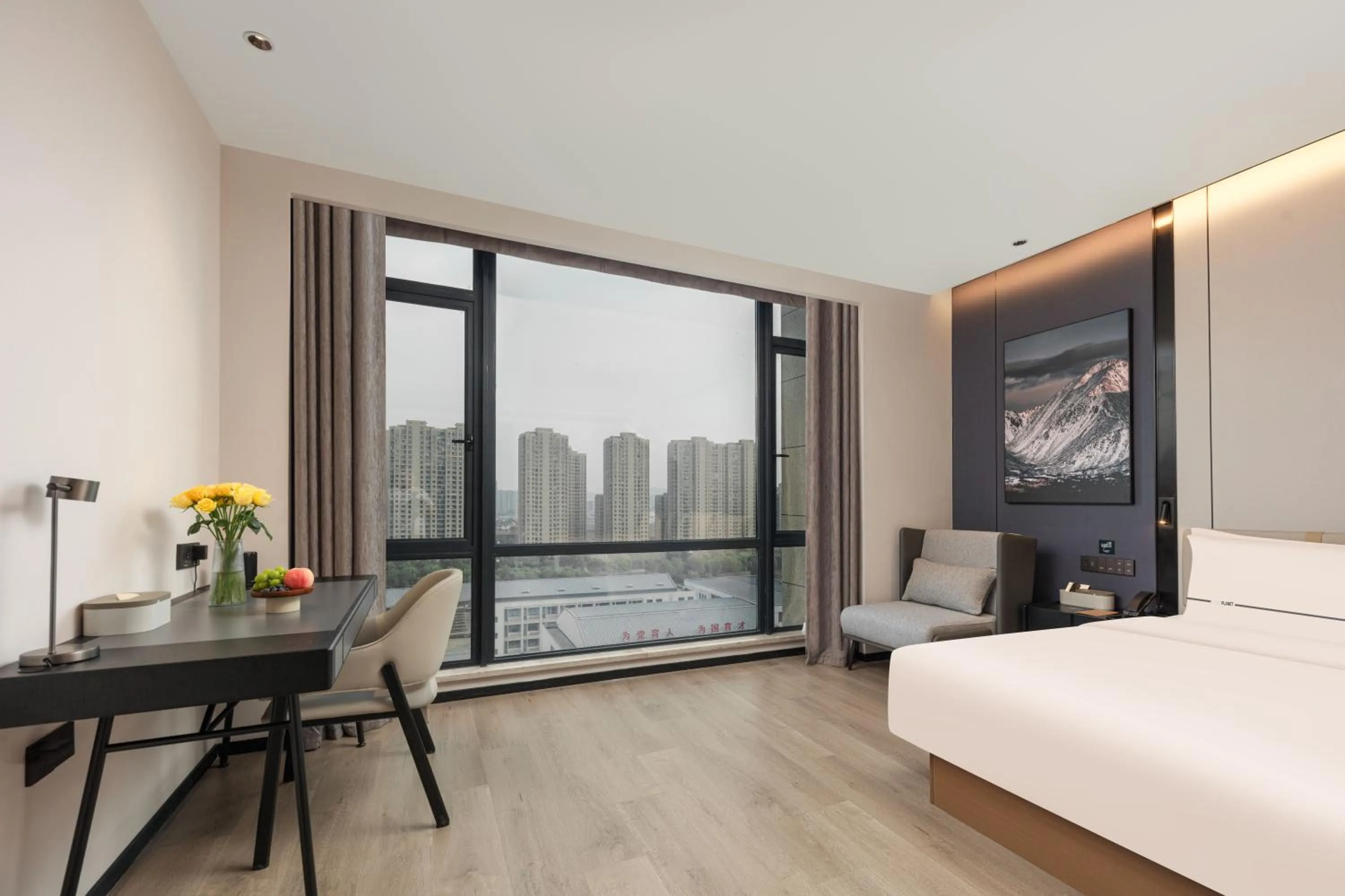 Seating area, Bed in Atour Hotel Hangzhou Xiaoshan Kaiyuan Plaza