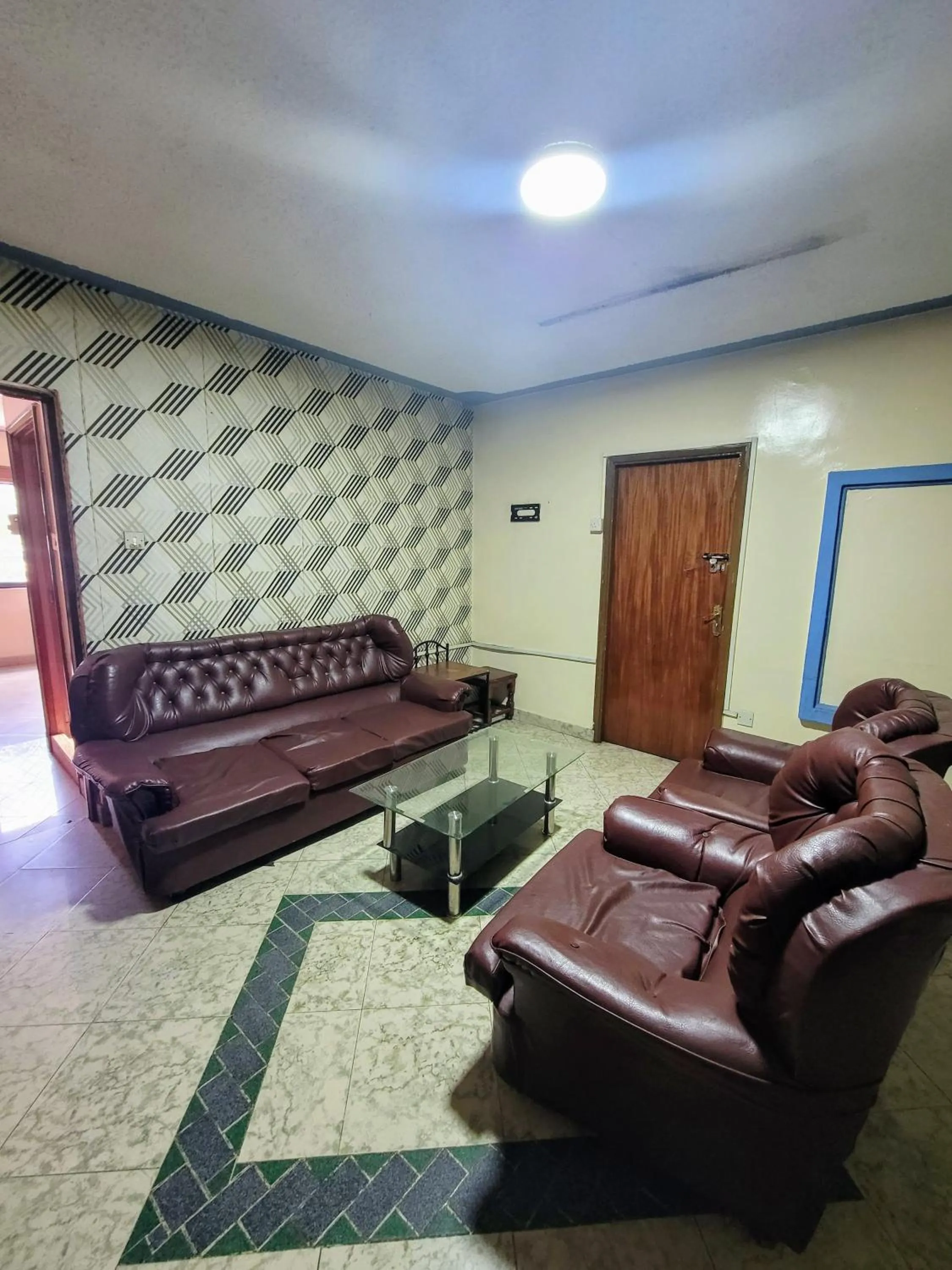 Living room in Nairobi Glory Palace Hotel