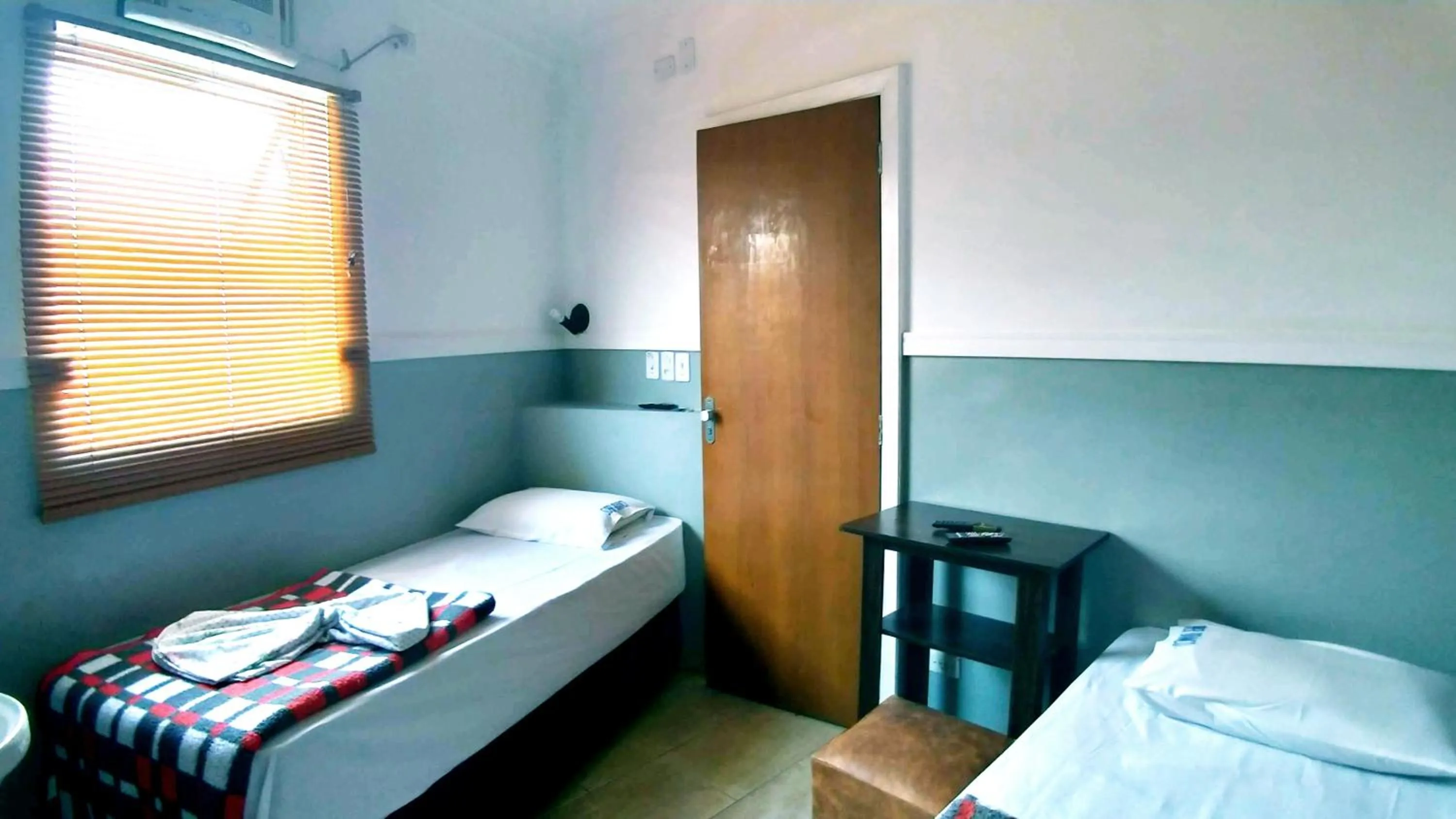 Photo of the whole room, Bed in HOTEL PAULISTANO Terminal Tietê