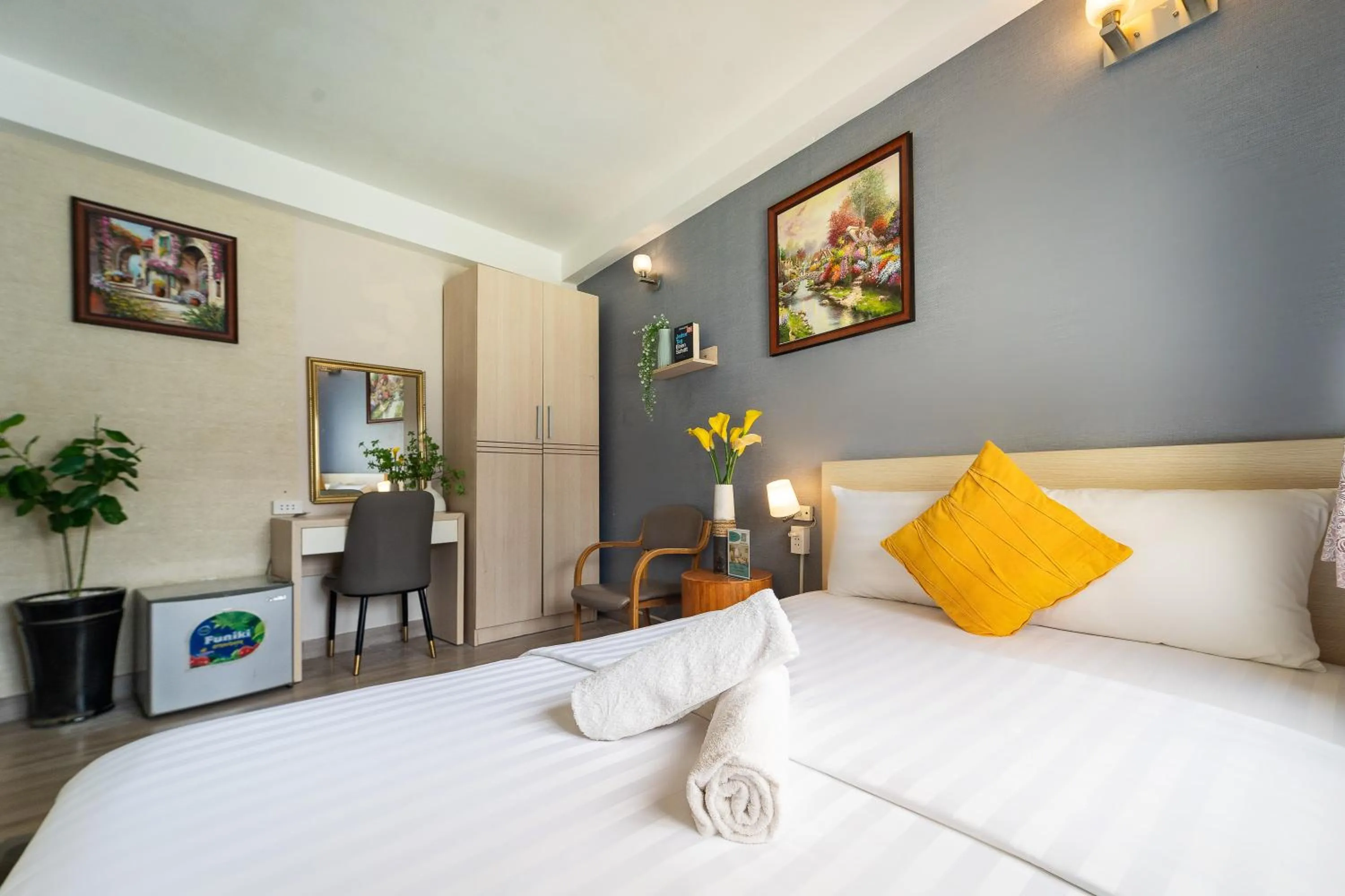 Bed in Galaxy Boutique Sai Gon Central Hotel