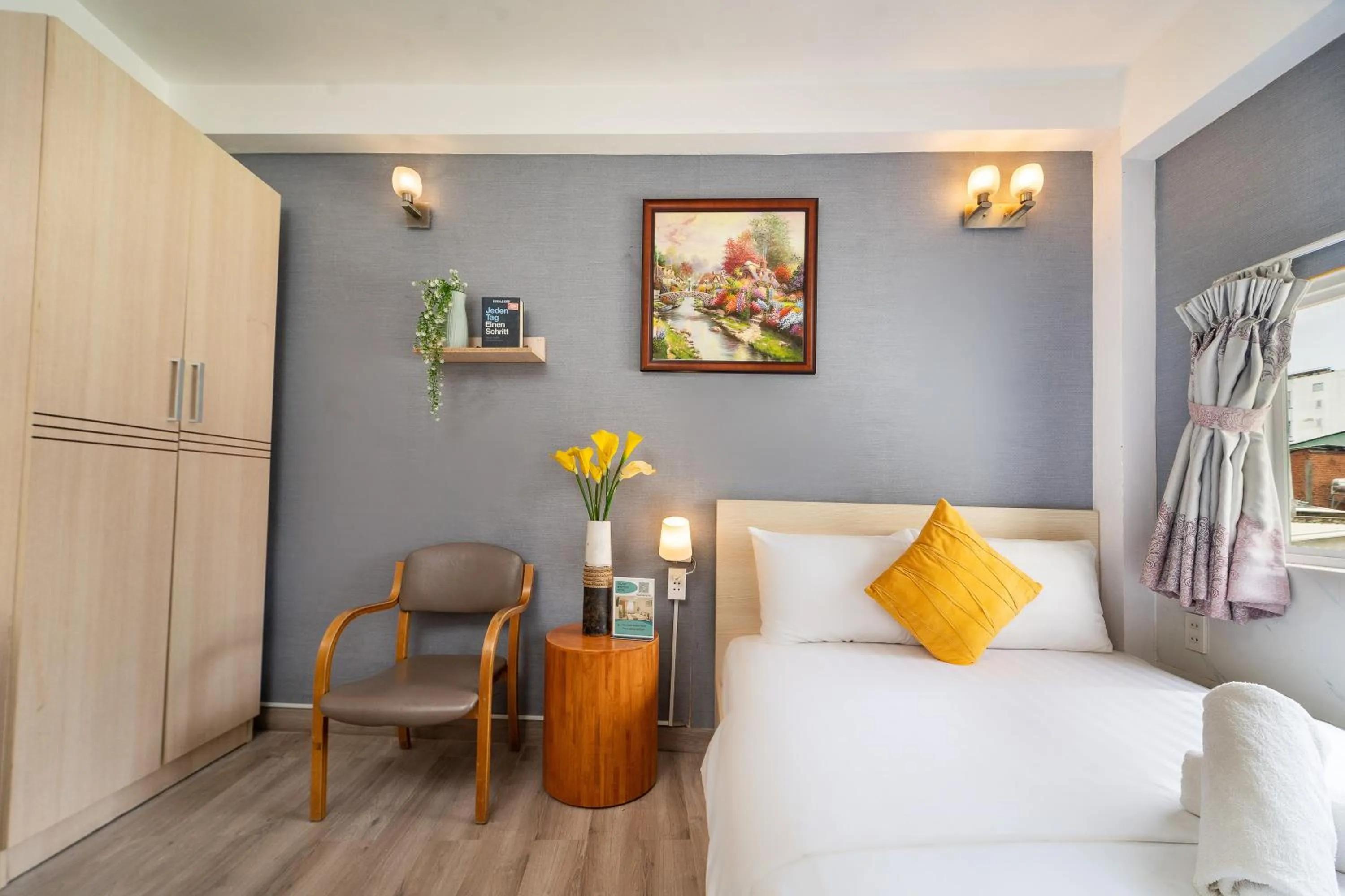 Bed in Galaxy Boutique Sai Gon Central Hotel