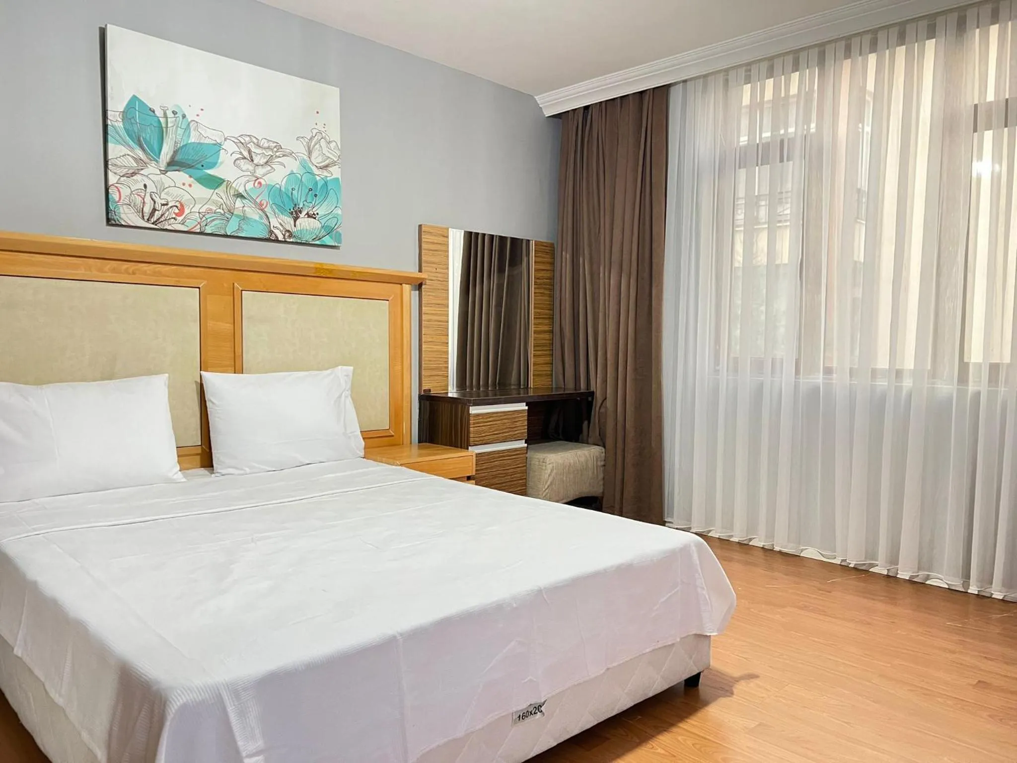 Bed in City Blue Hotel