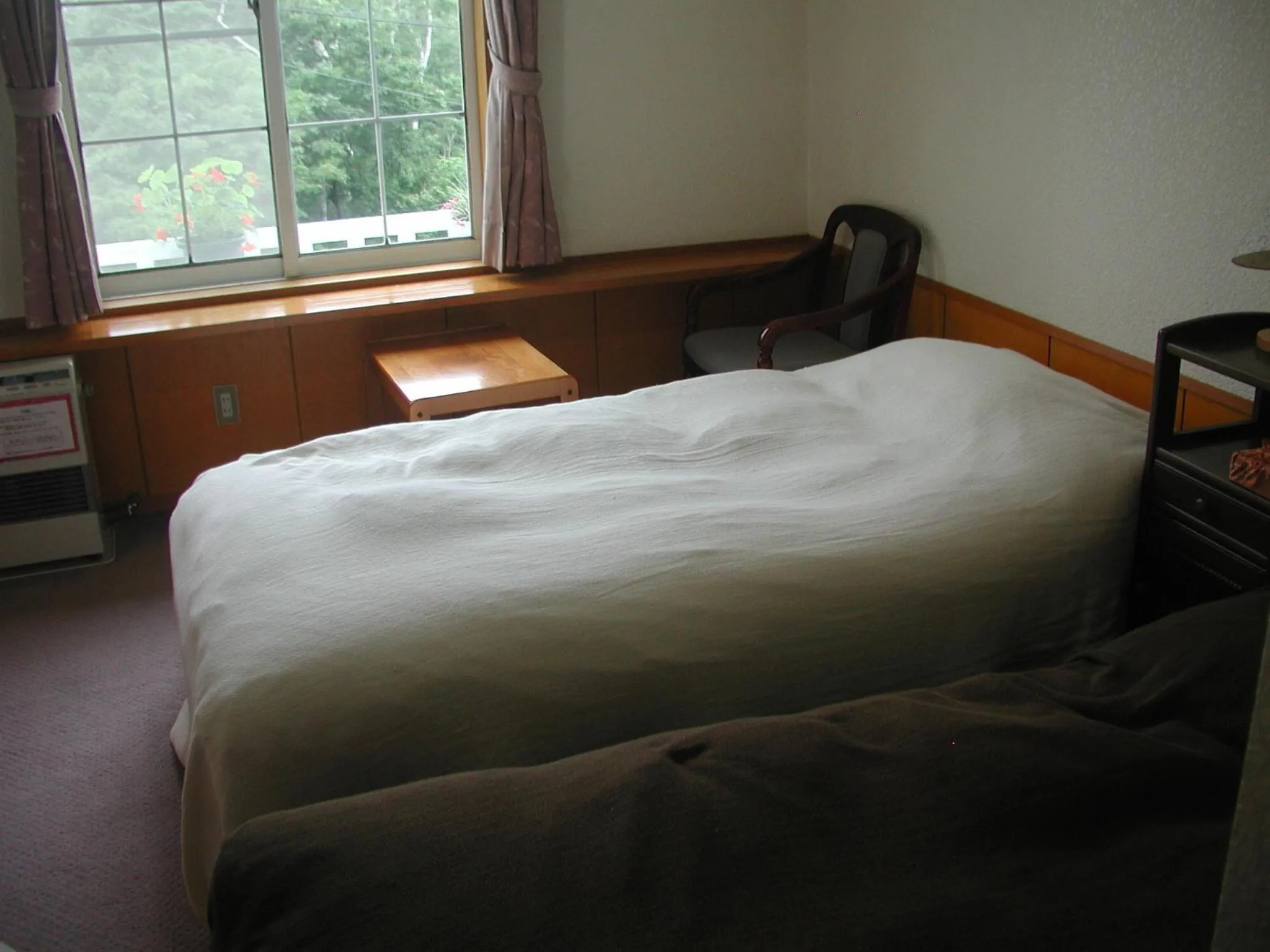 Bed in Marchen House Madarao