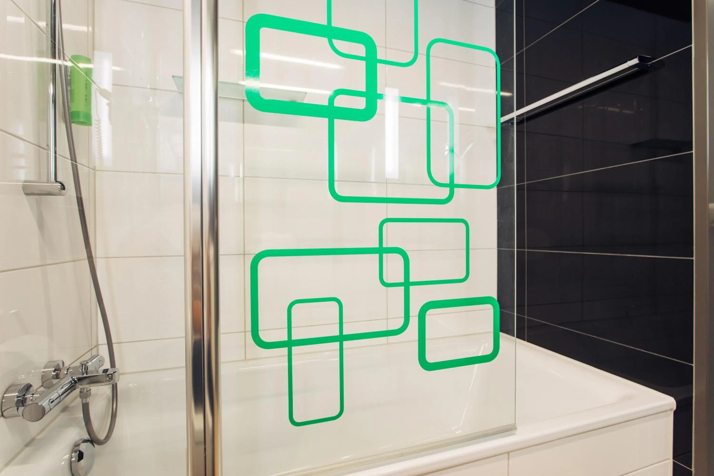 Bathroom in harry's home München hotel & apartments