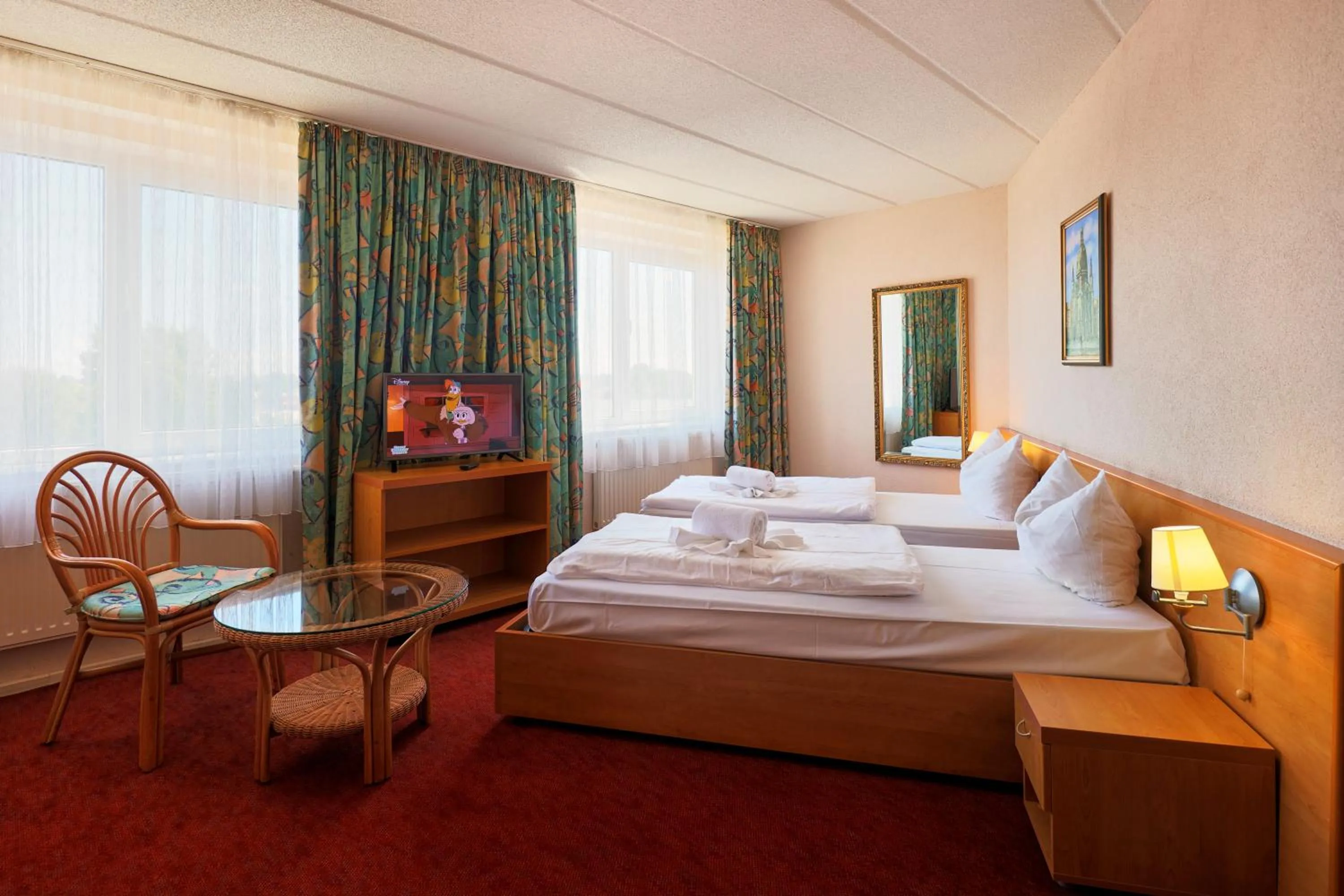 Bed in TRIP INN Axxon Hotel