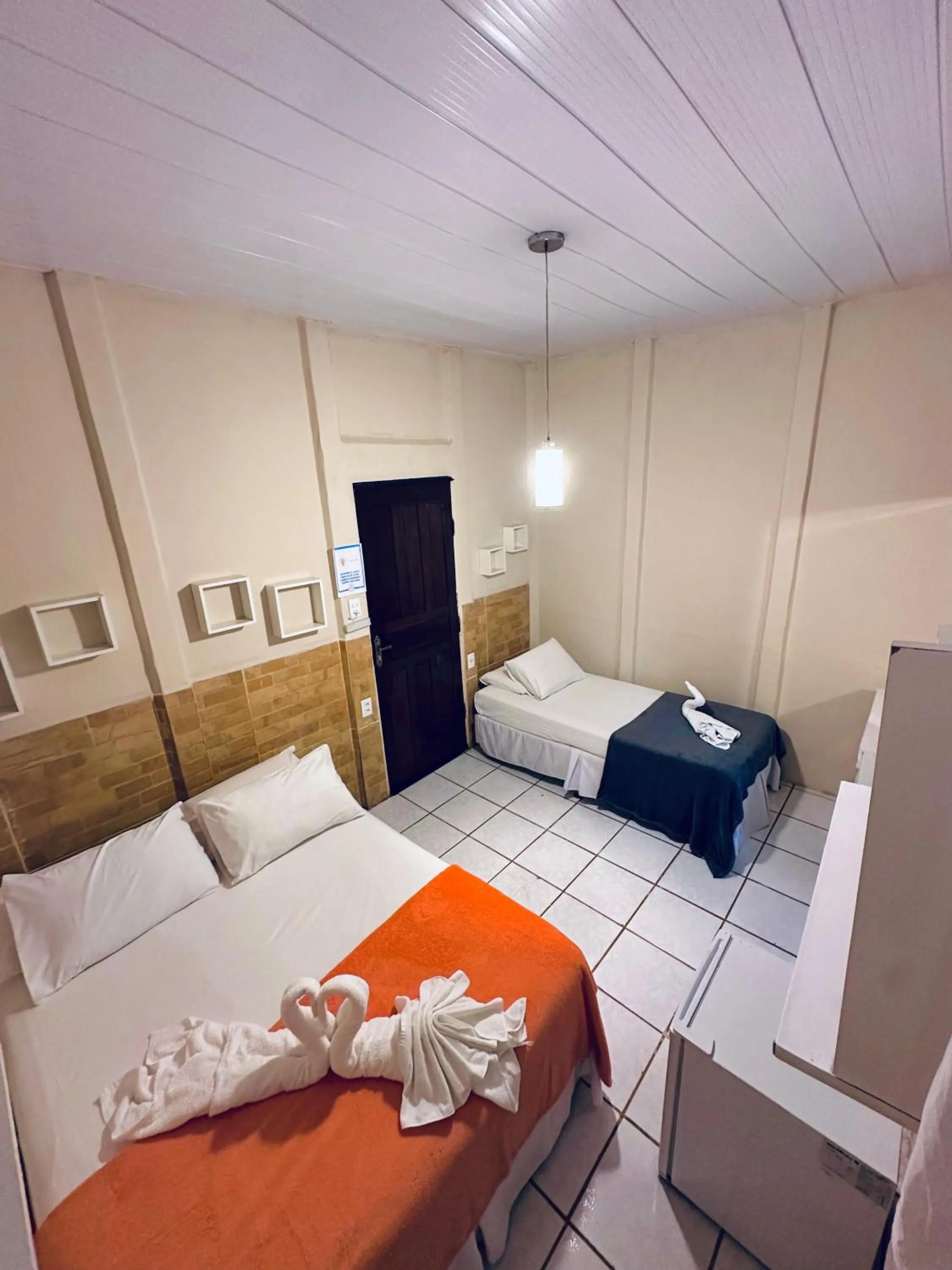 Bed in Pousada do Golfinho Fernando de Noronha