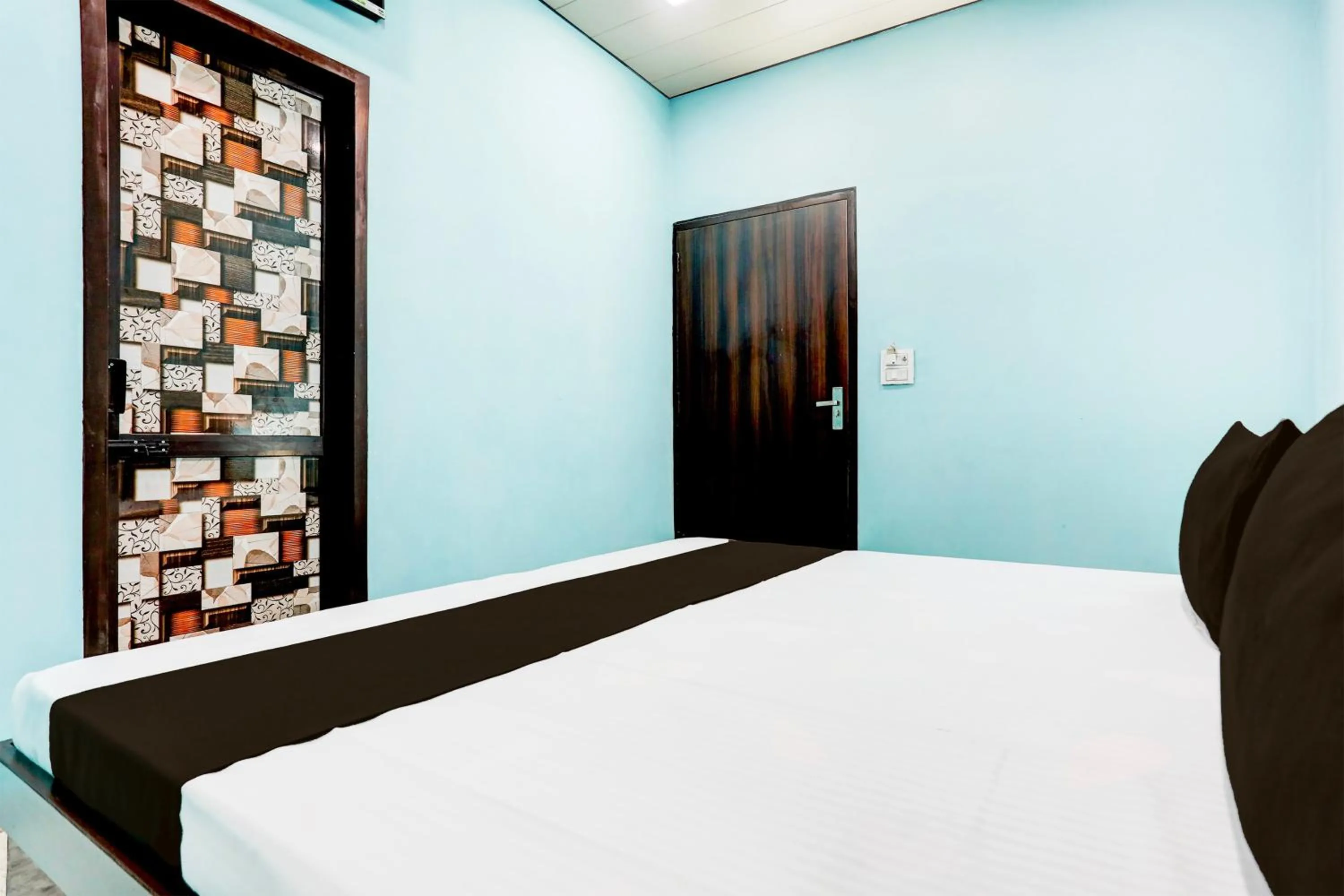 Bedroom, Bed in Hotel O Shiv Sai Guest House