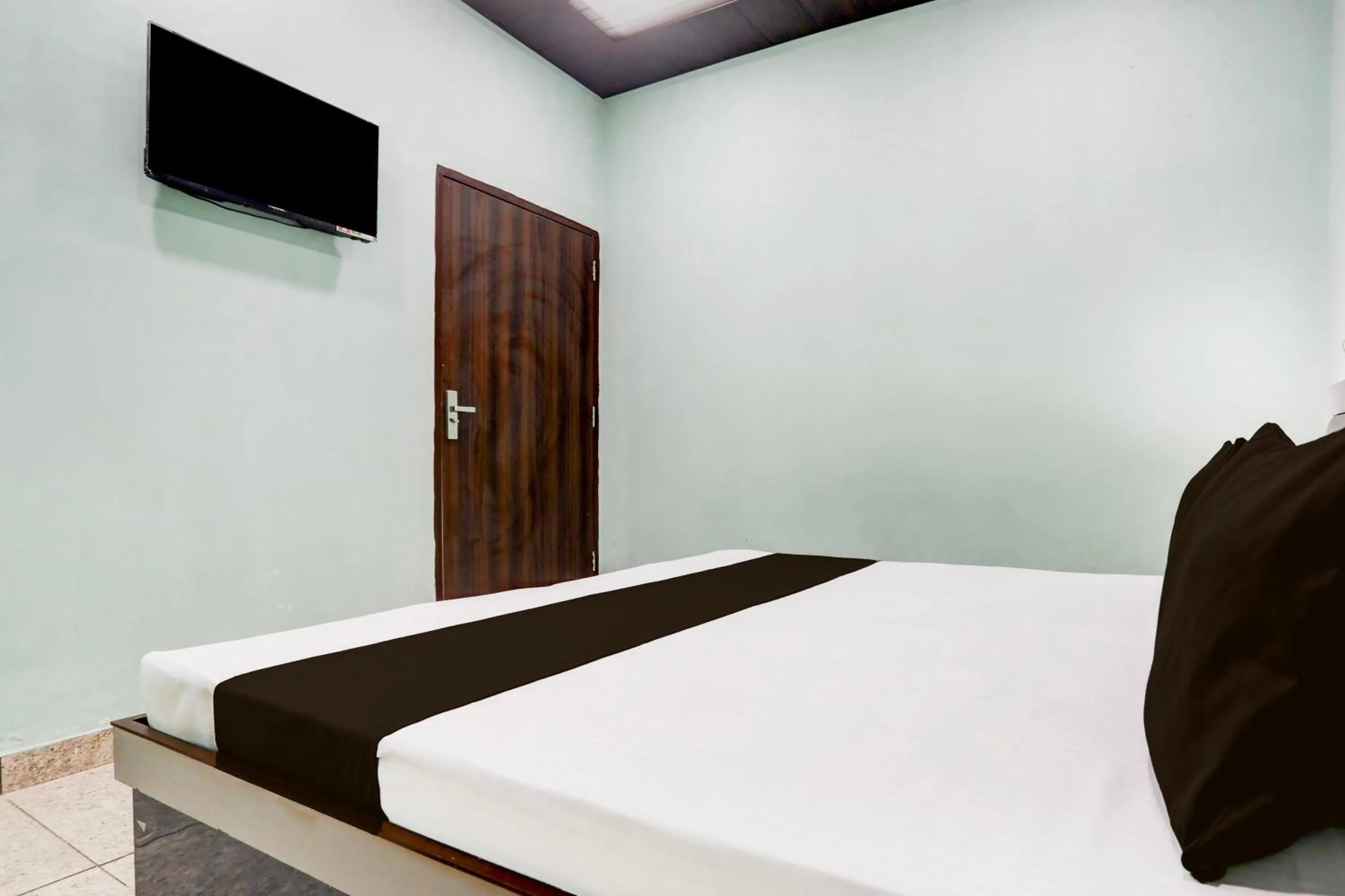 Bedroom, Bed in Hotel O Shiv Sai Guest House