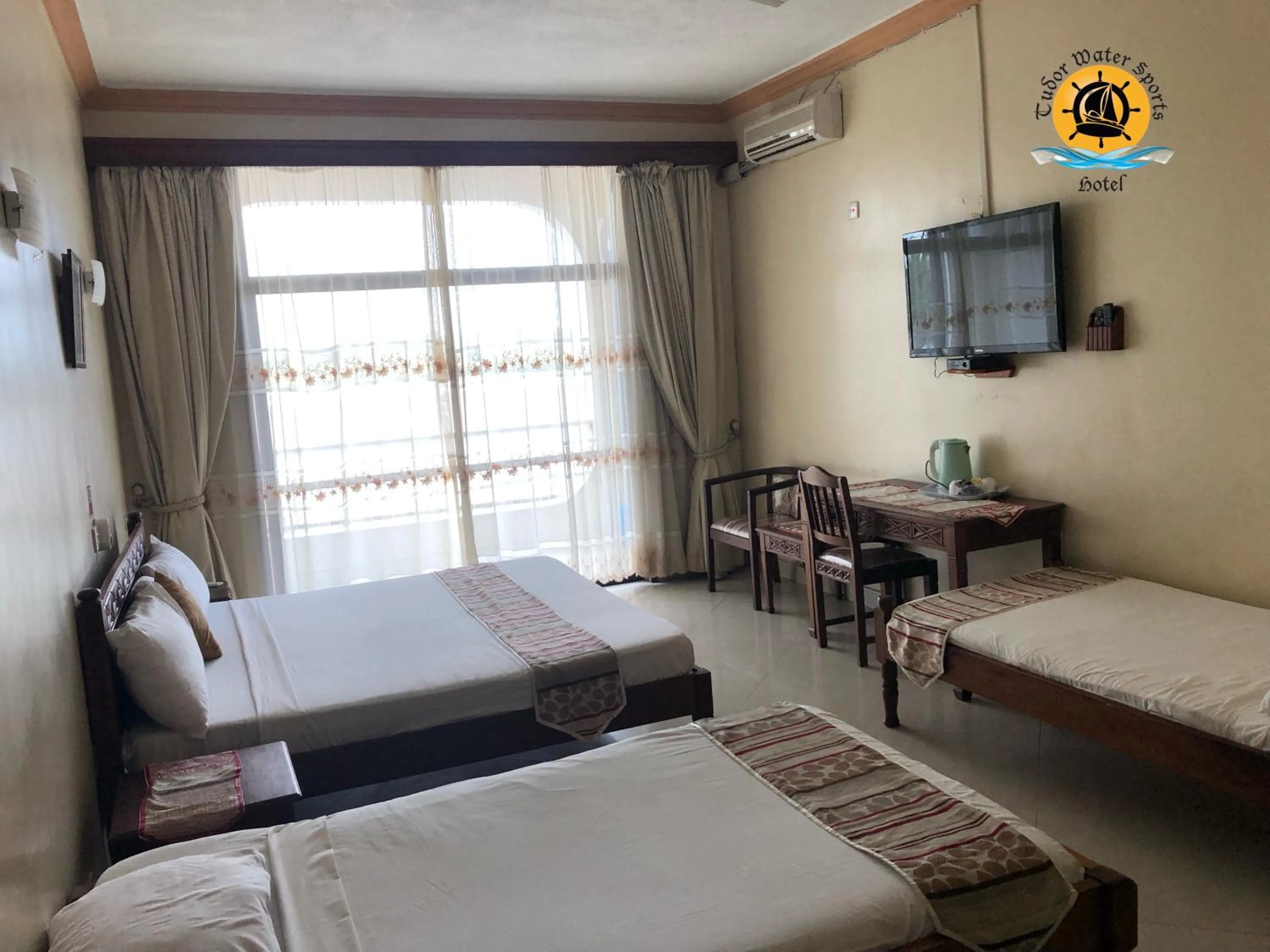 Property building, Bed in Tudor Water Sports Hotel