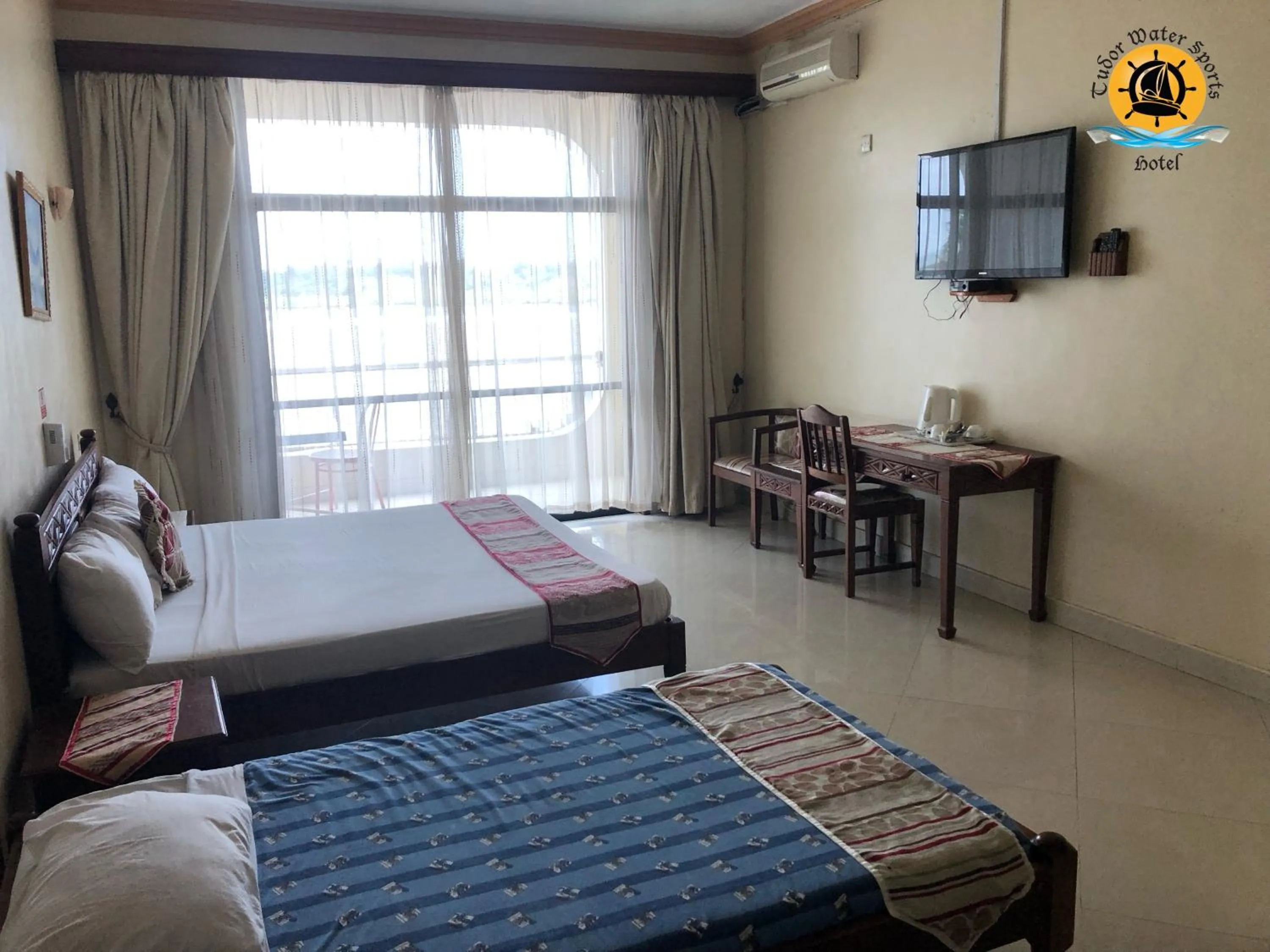 Property building, Bed in Tudor Water Sports Hotel