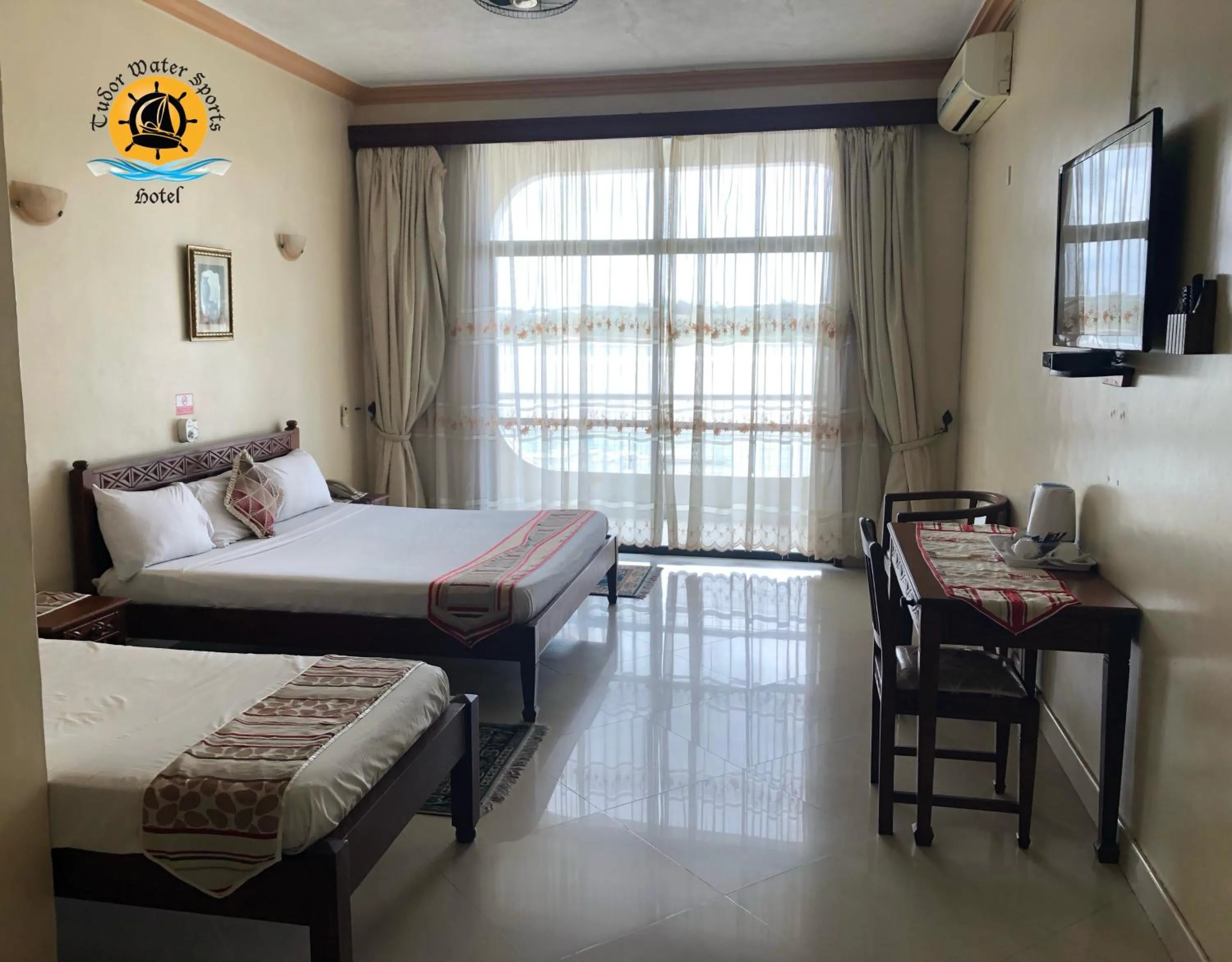 Property building, Bed in Tudor Water Sports Hotel
