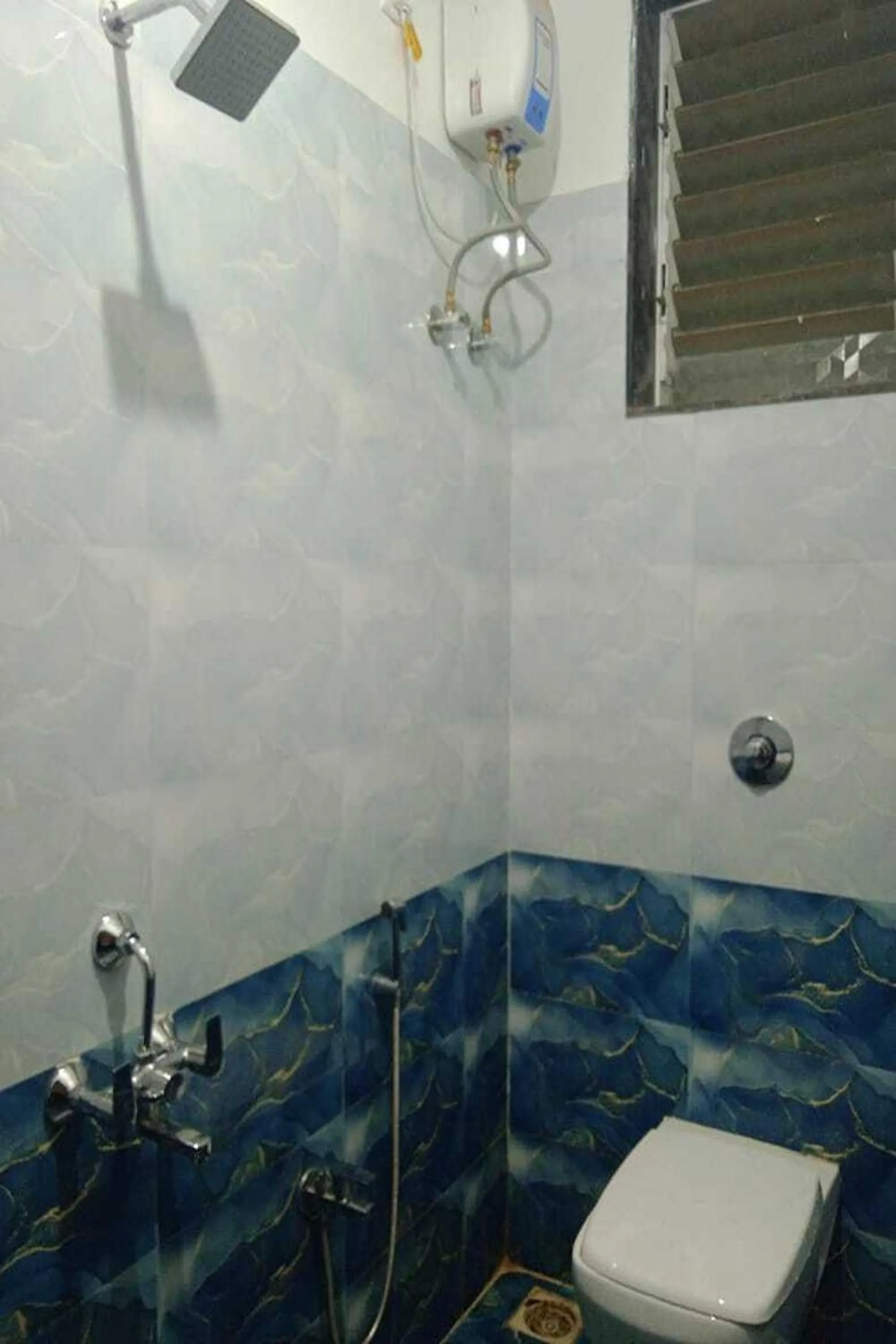 Shower in Vighnaharta Villa