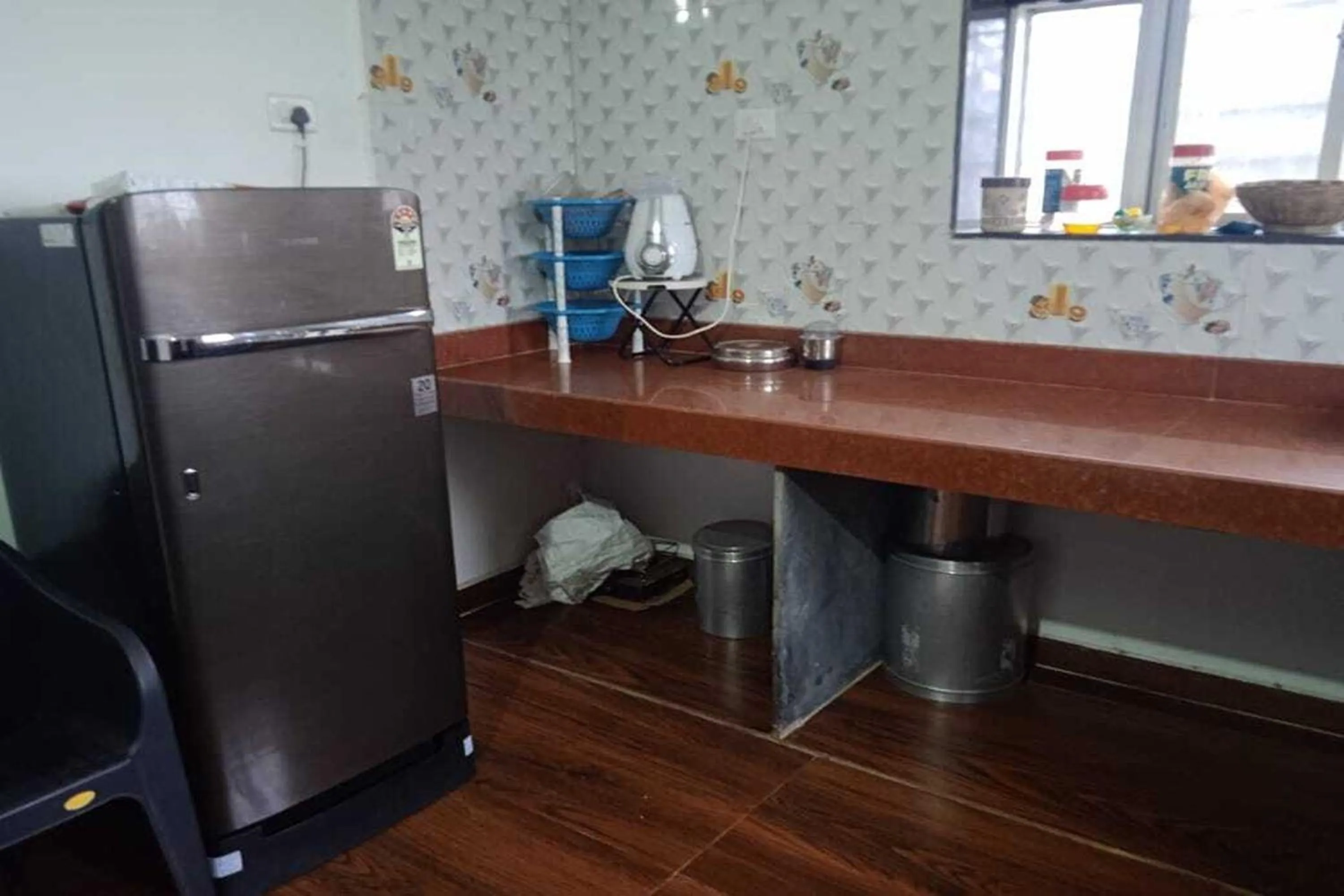 Kitchen or kitchenette in Vighnaharta Villa