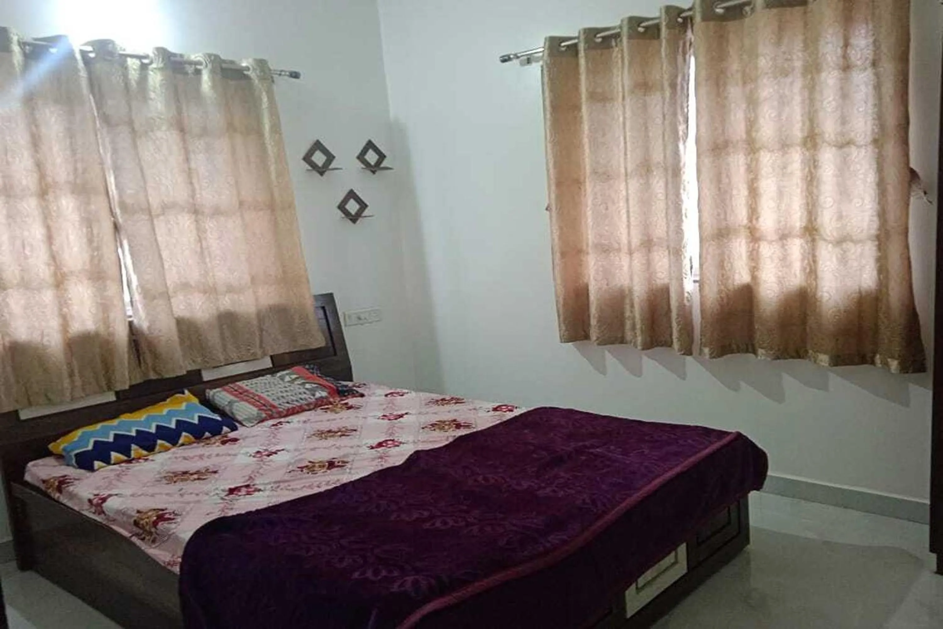 Bed in Vighnaharta Villa