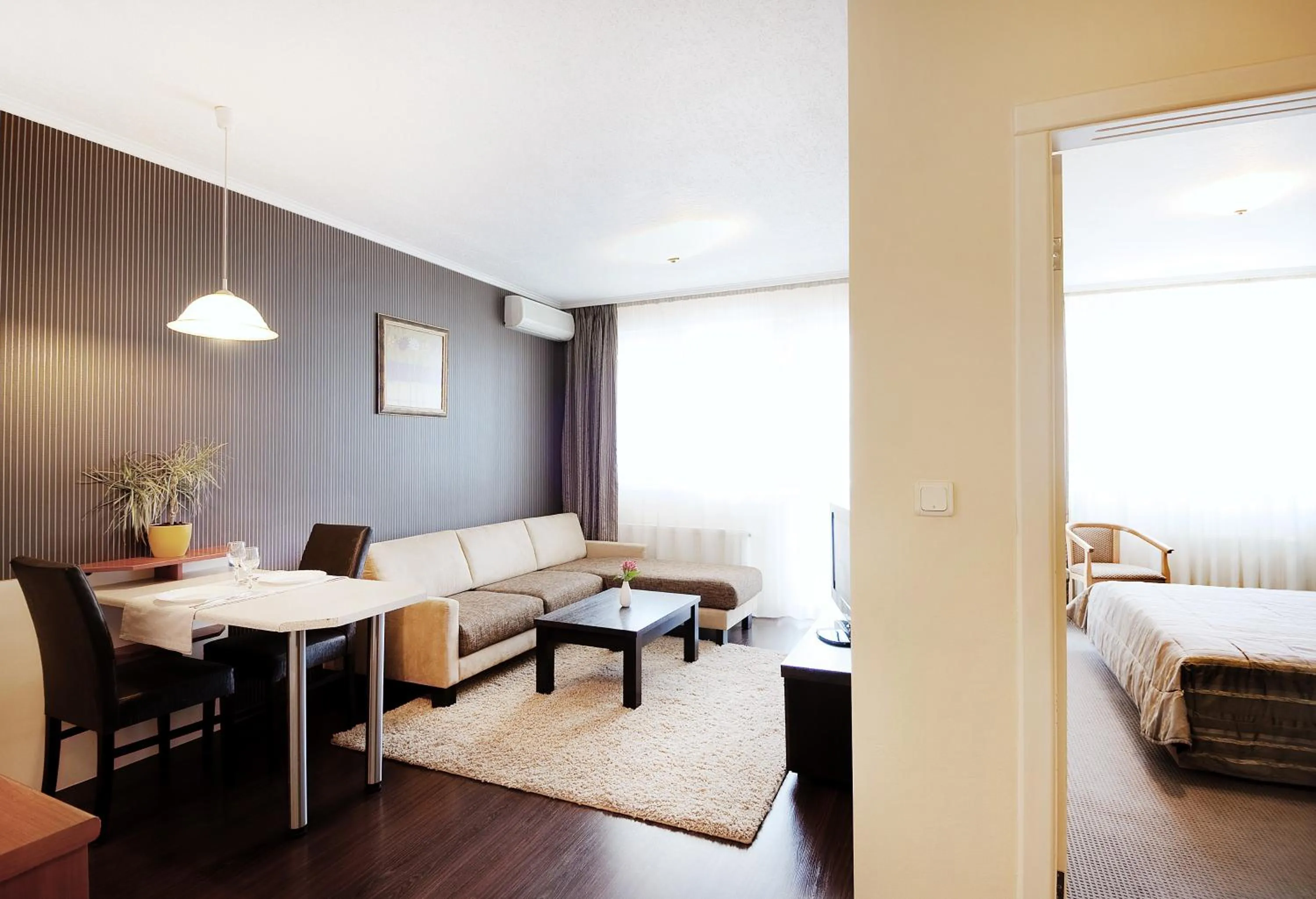 Living room, Bed in Apartments Carrera