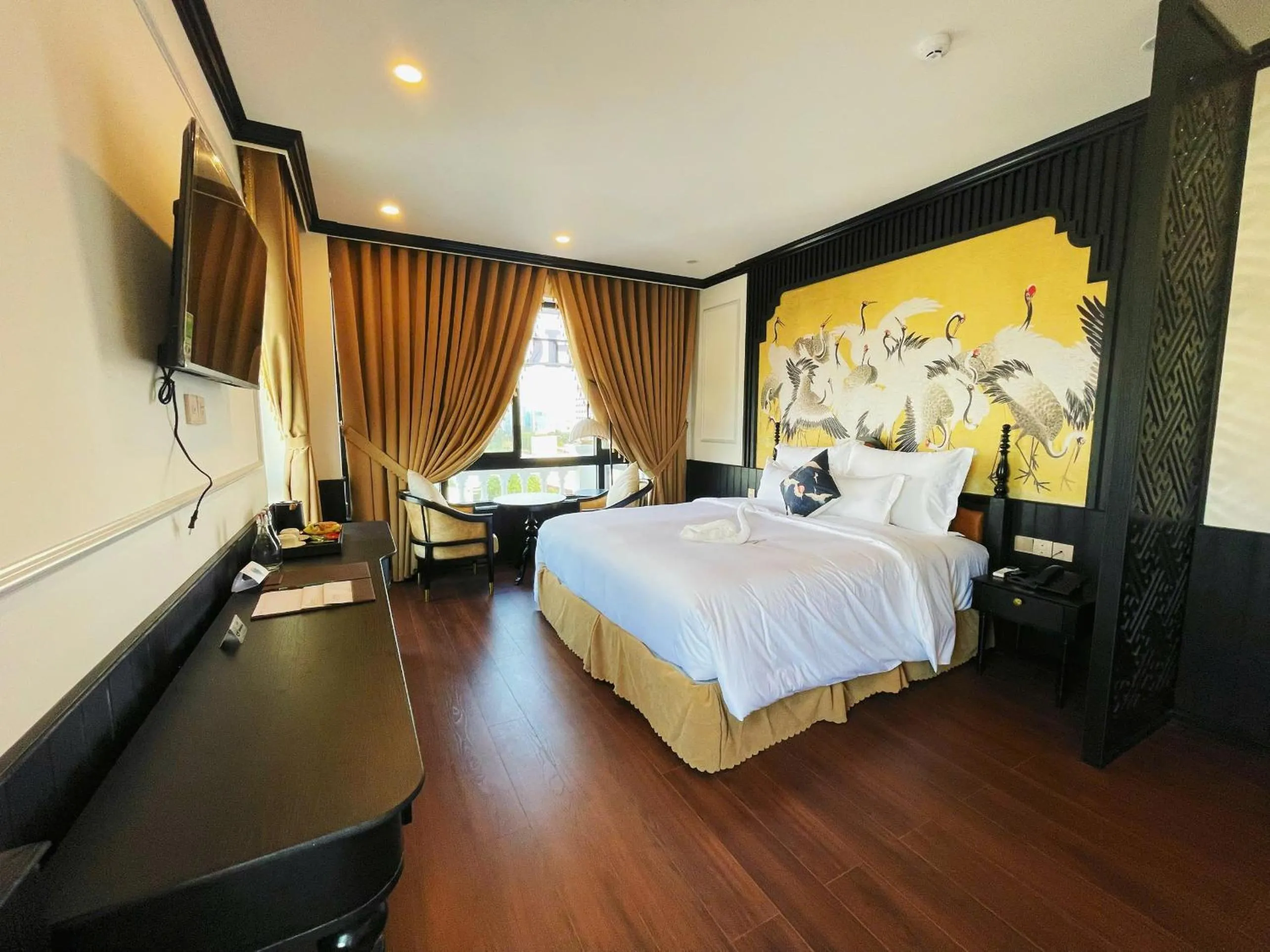 Bed in The ORCHID PREMIUM Hotel