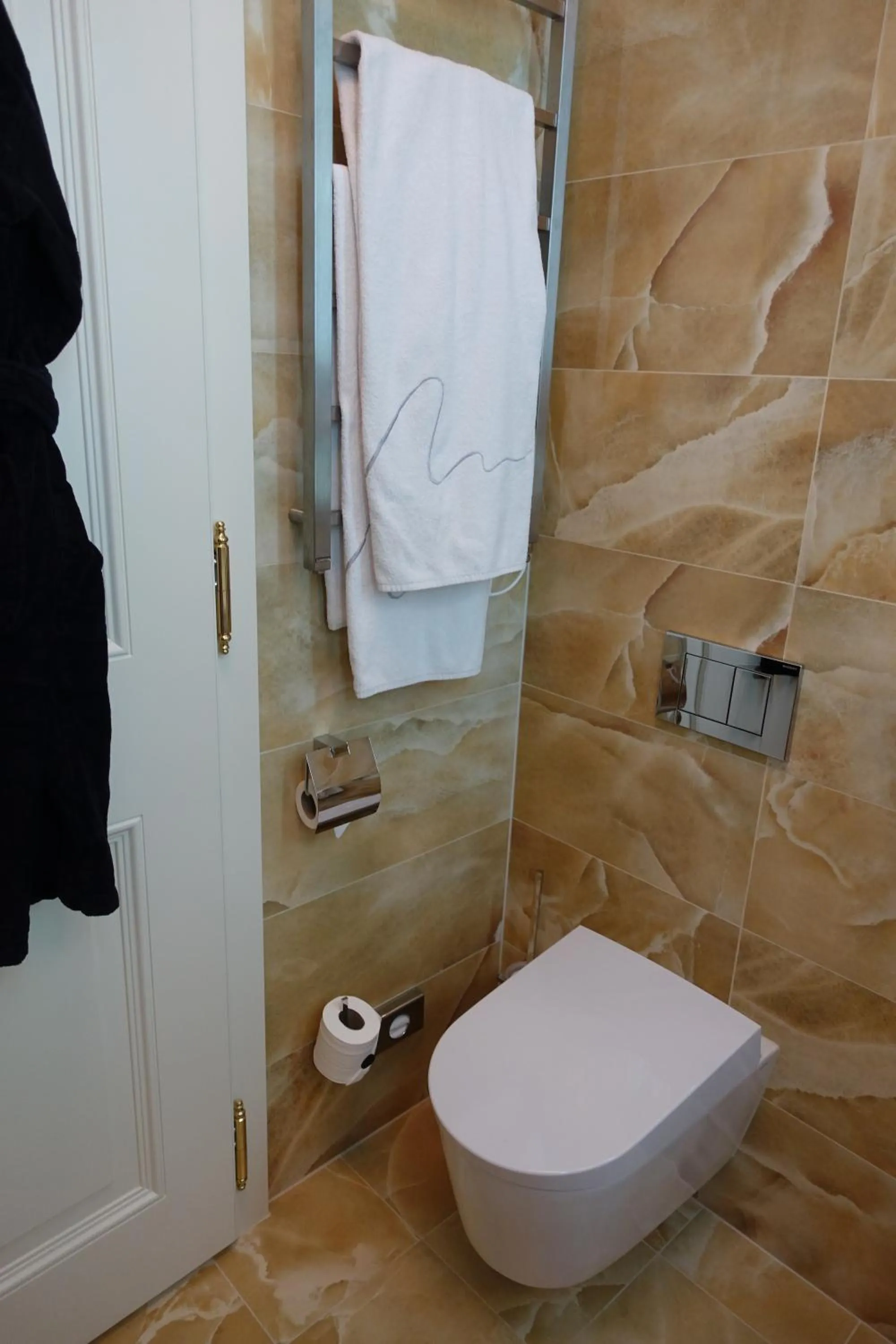 Toilet in Aria Hotel Budapest by Library Hotel Collection