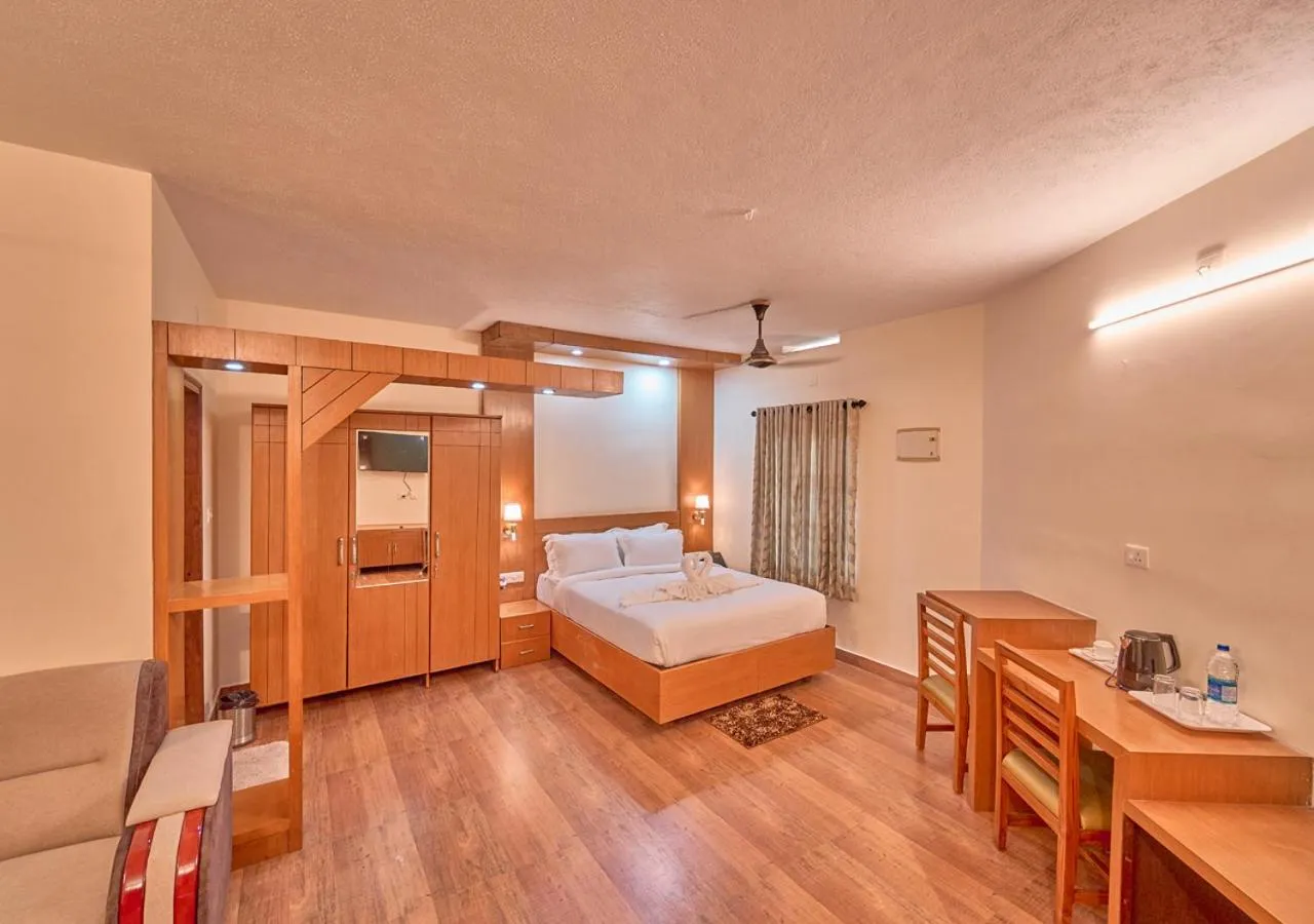 Bed in Ushasree Wayanad Premium Pool Resort by VOYE HOMES