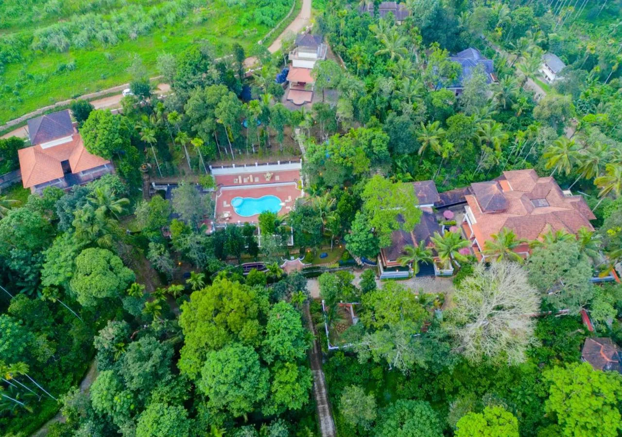 Property building in Ushasree Wayanad Premium Pool Resort by VOYE HOMES