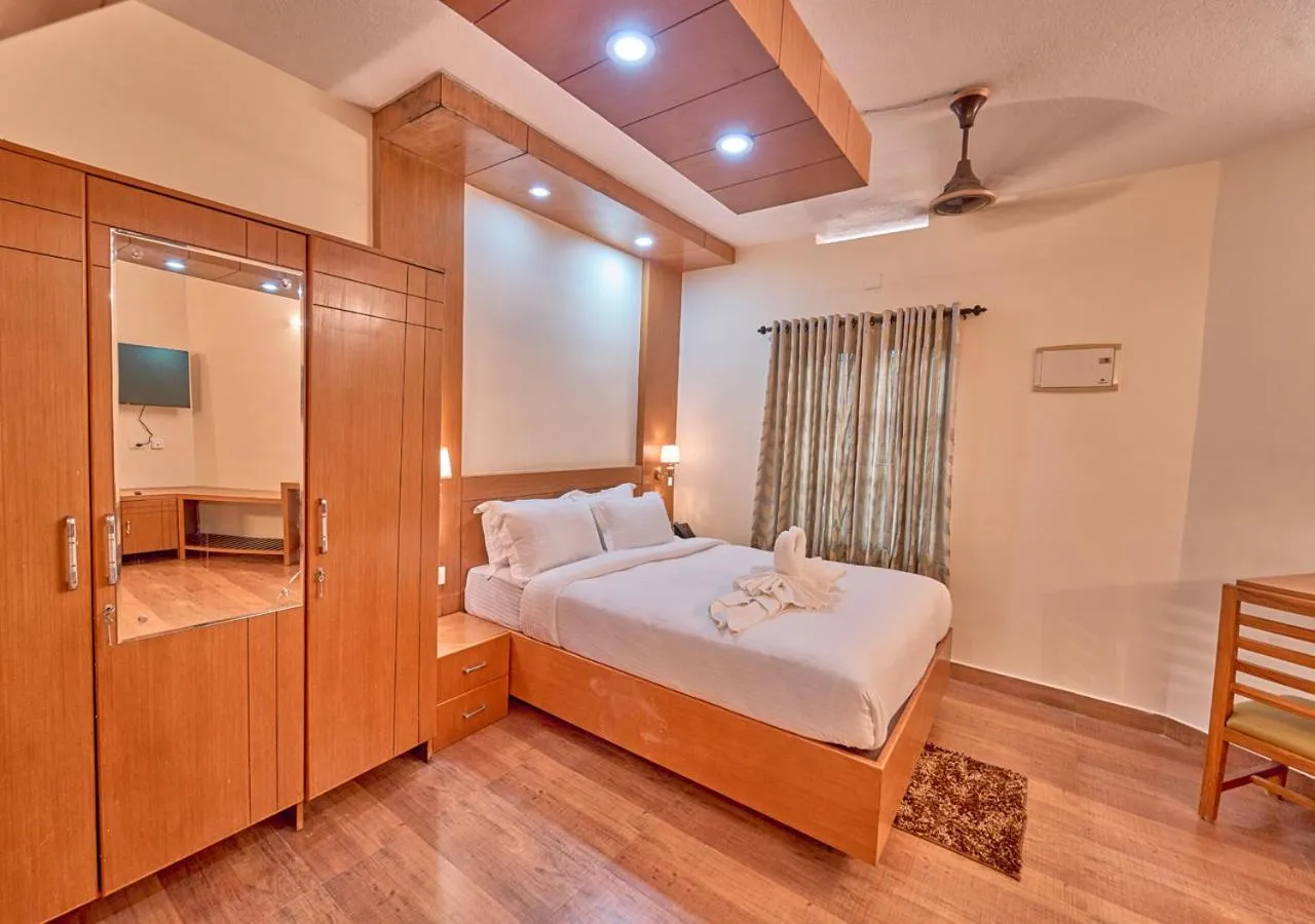 Bed in Ushasree Wayanad Premium Pool Resort by VOYE HOMES