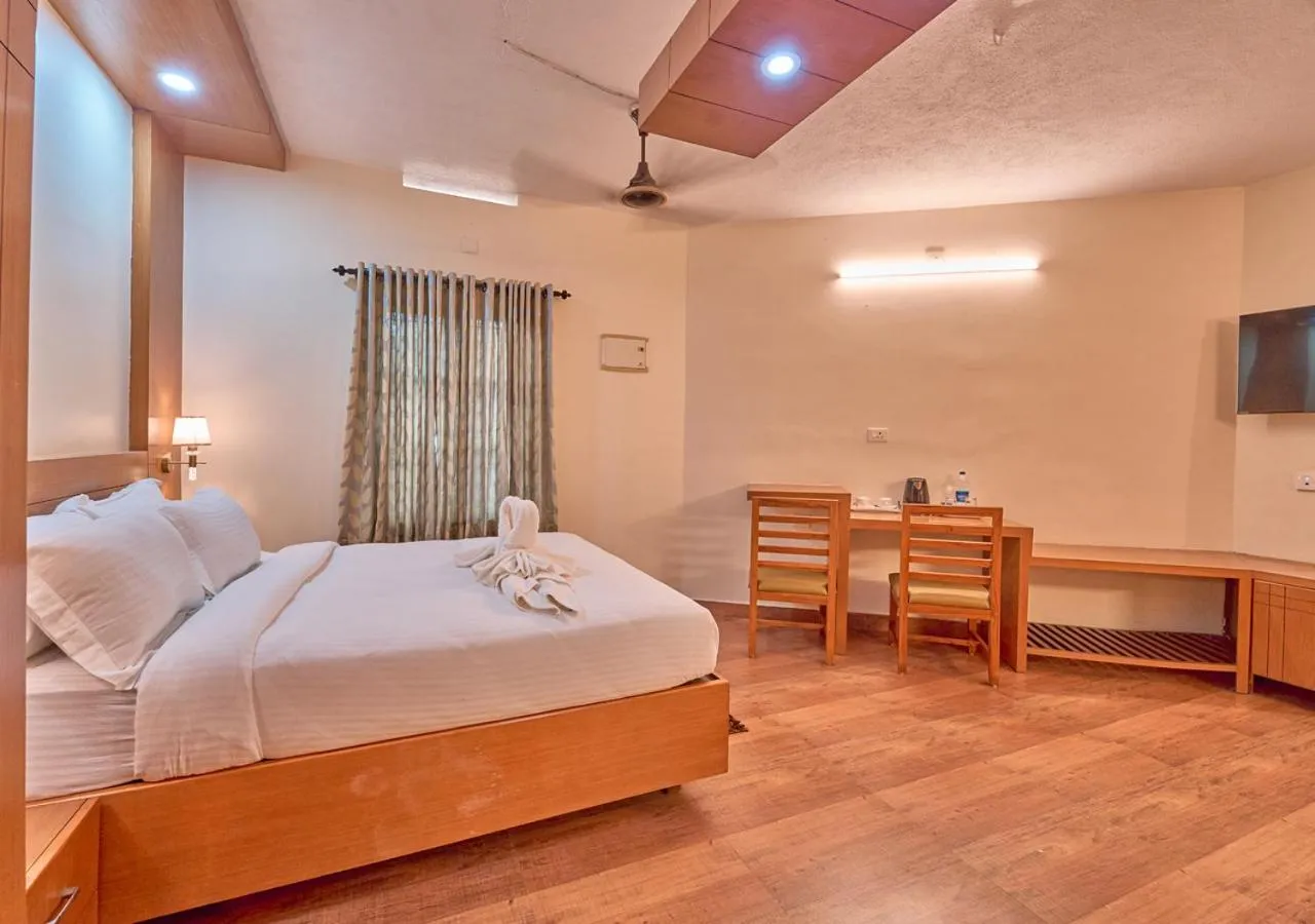 Bed in Ushasree Wayanad Premium Pool Resort by VOYE HOMES