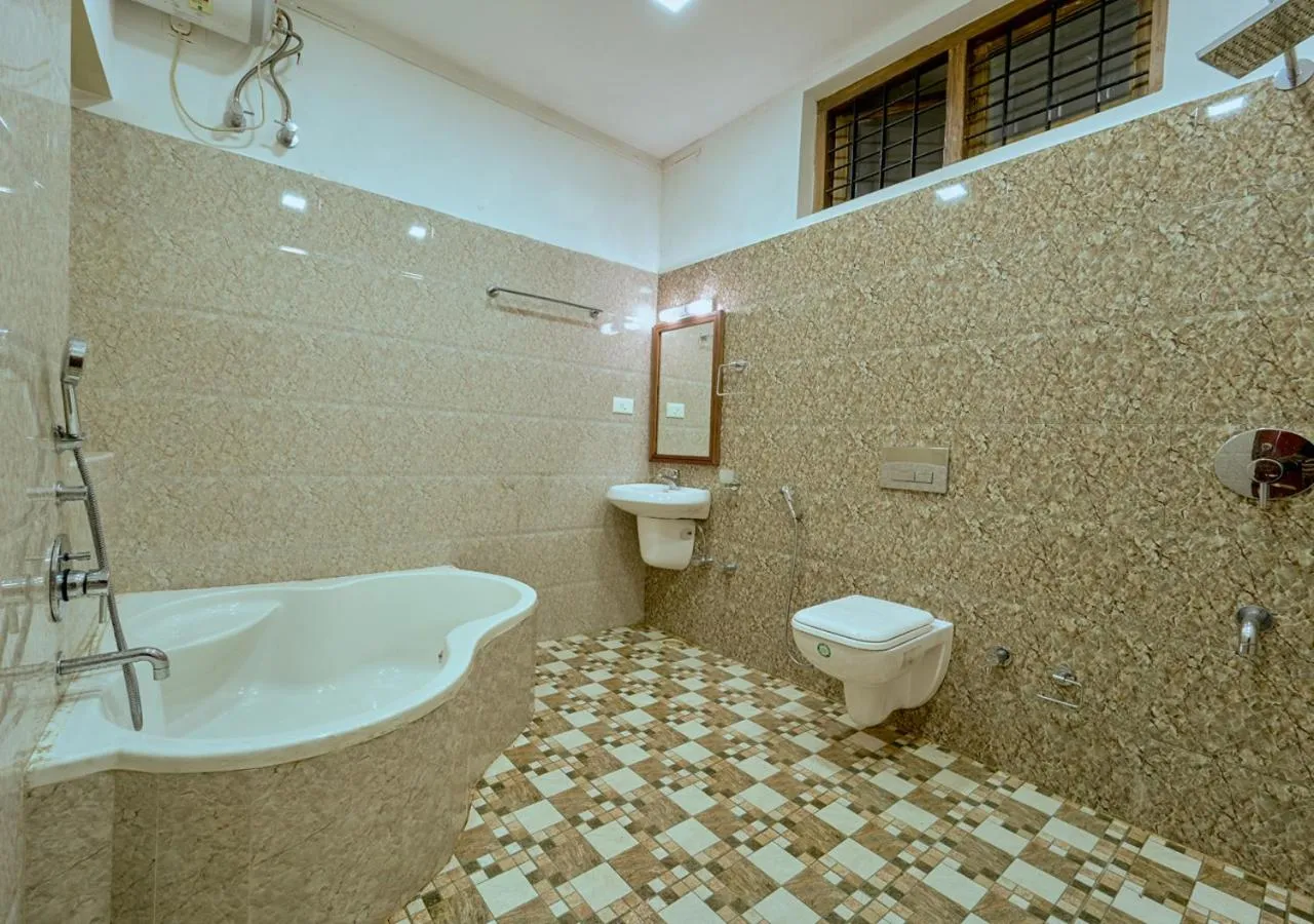 Toilet in Ushasree Wayanad Premium Pool Resort by VOYE HOMES