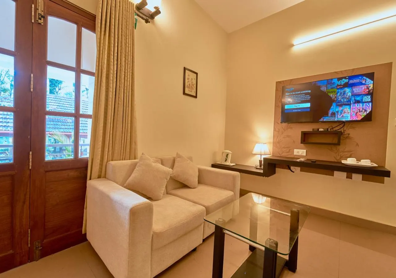 Seating area in Ushasree Wayanad Premium Pool Resort by VOYE HOMES