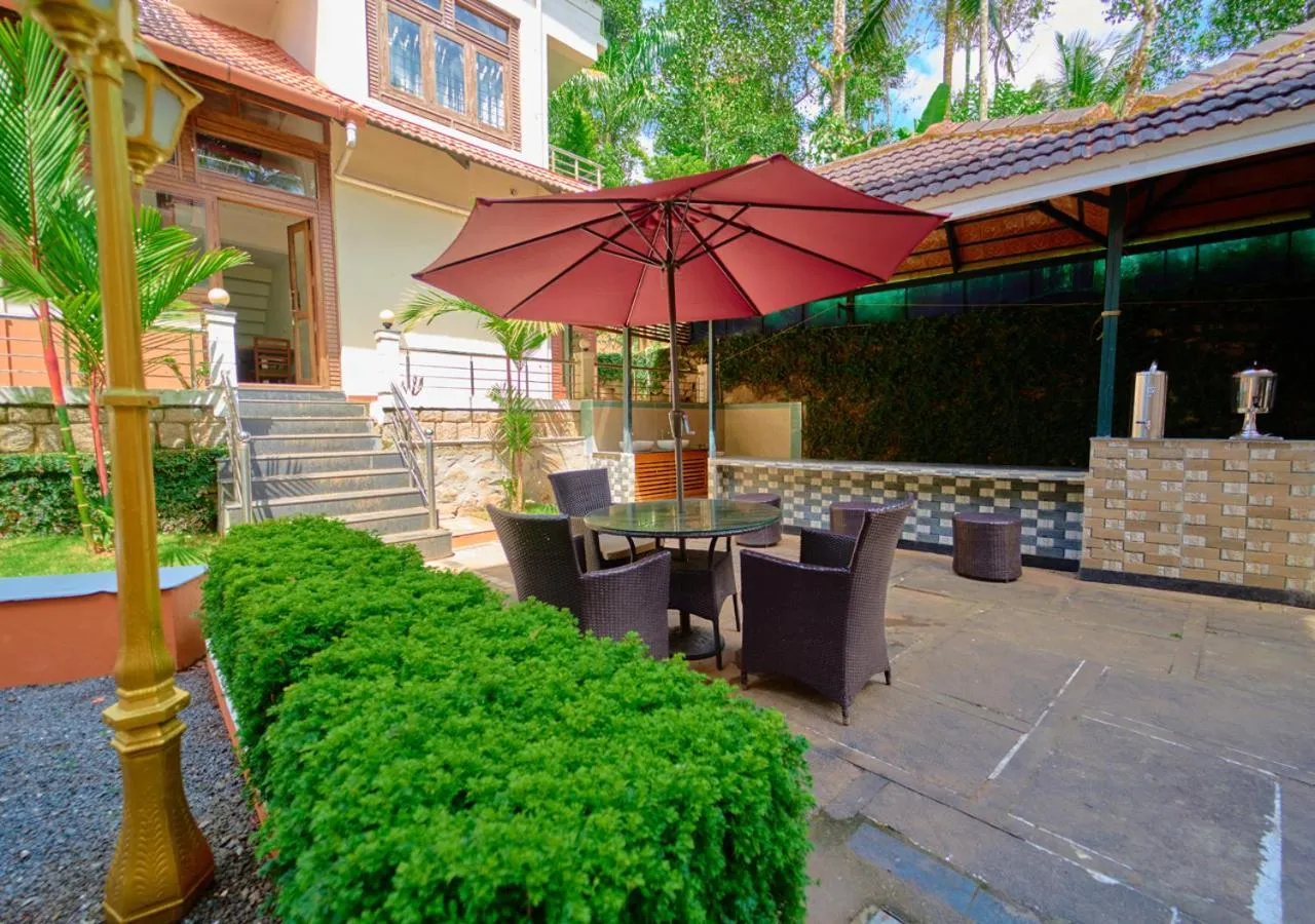 Property building in Ushasree Wayanad Premium Pool Resort by VOYE HOMES