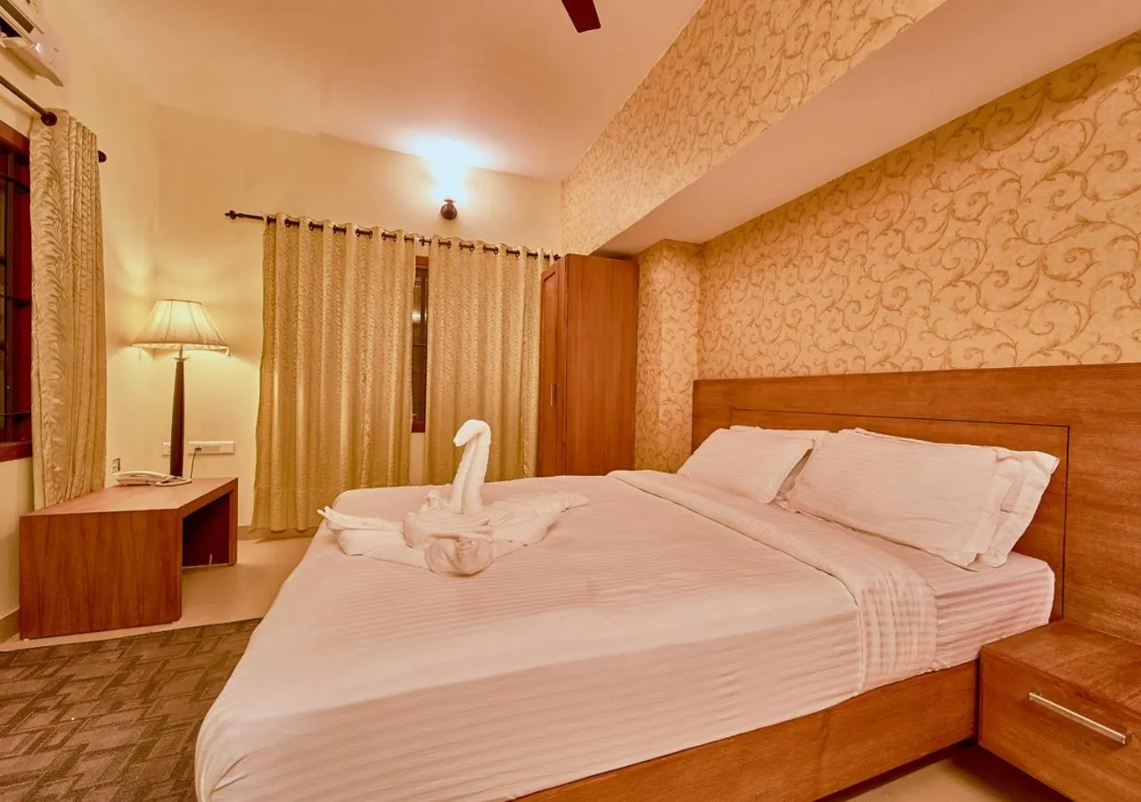 Bed in Ushasree Wayanad Premium Pool Resort by VOYE HOMES