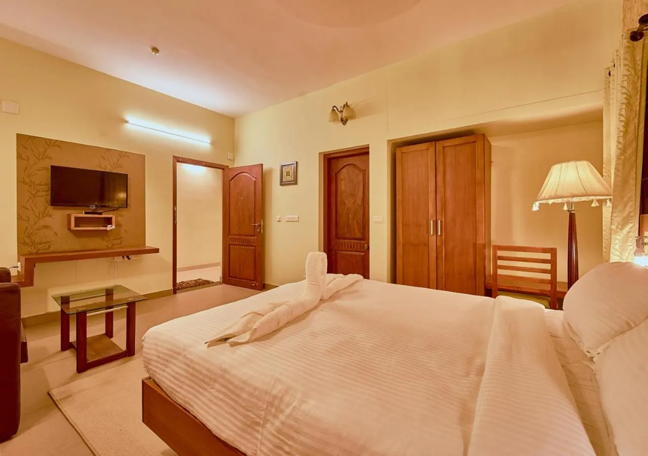 Bed in Ushasree Wayanad Premium Pool Resort by VOYE HOMES