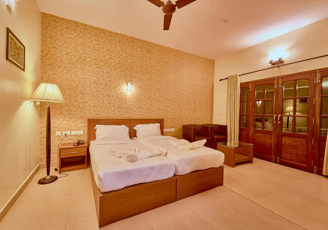 Photo of the whole room, Bed in Ushasree Wayanad Premium Pool Resort by VOYE HOMES
