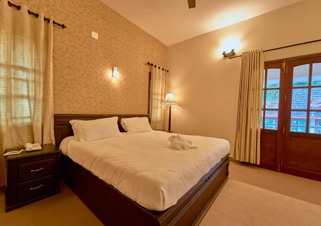 Photo of the whole room, Bed in Ushasree Wayanad Premium Pool Resort by VOYE HOMES