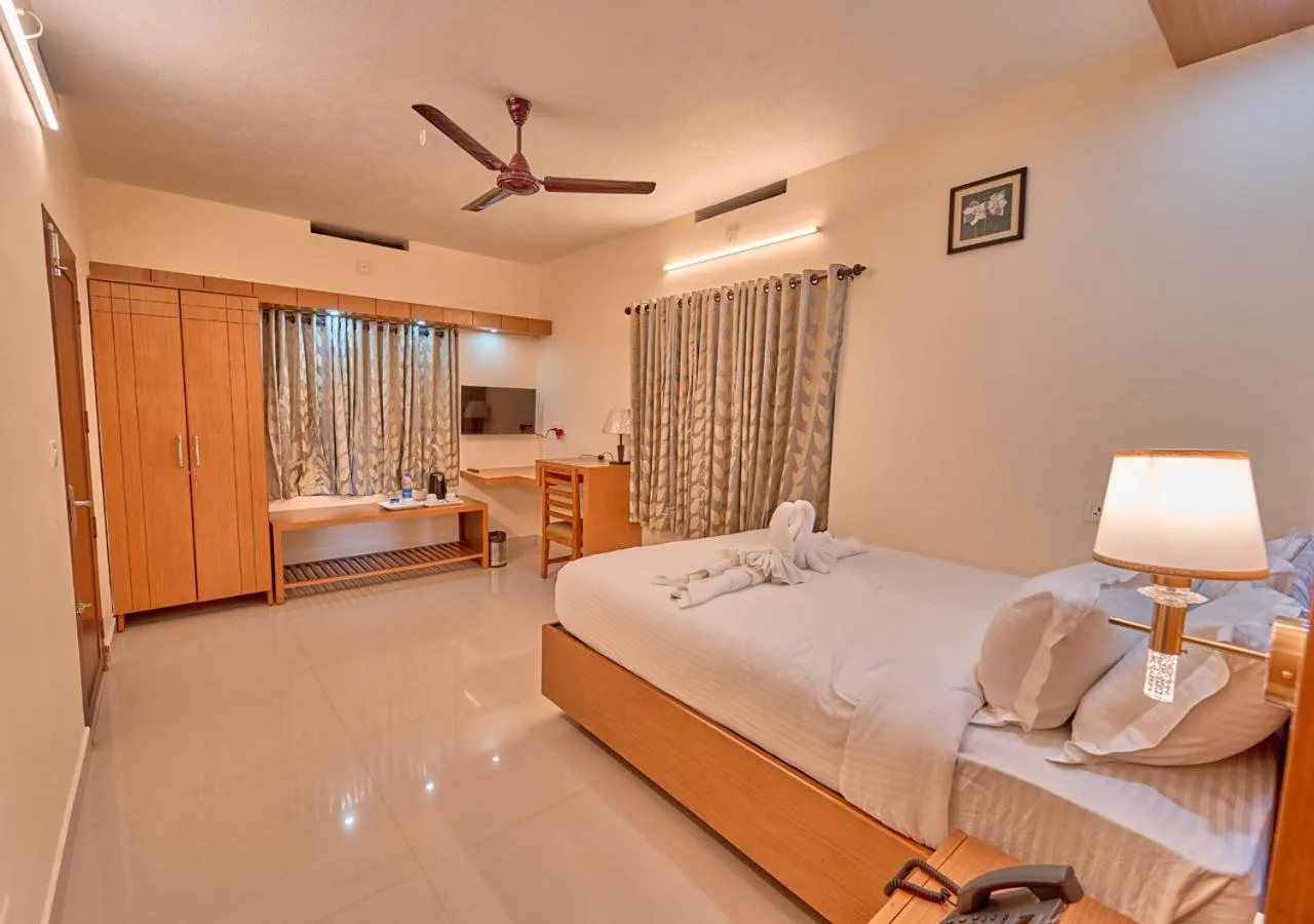 Bed in Ushasree Wayanad Premium Pool Resort by VOYE HOMES