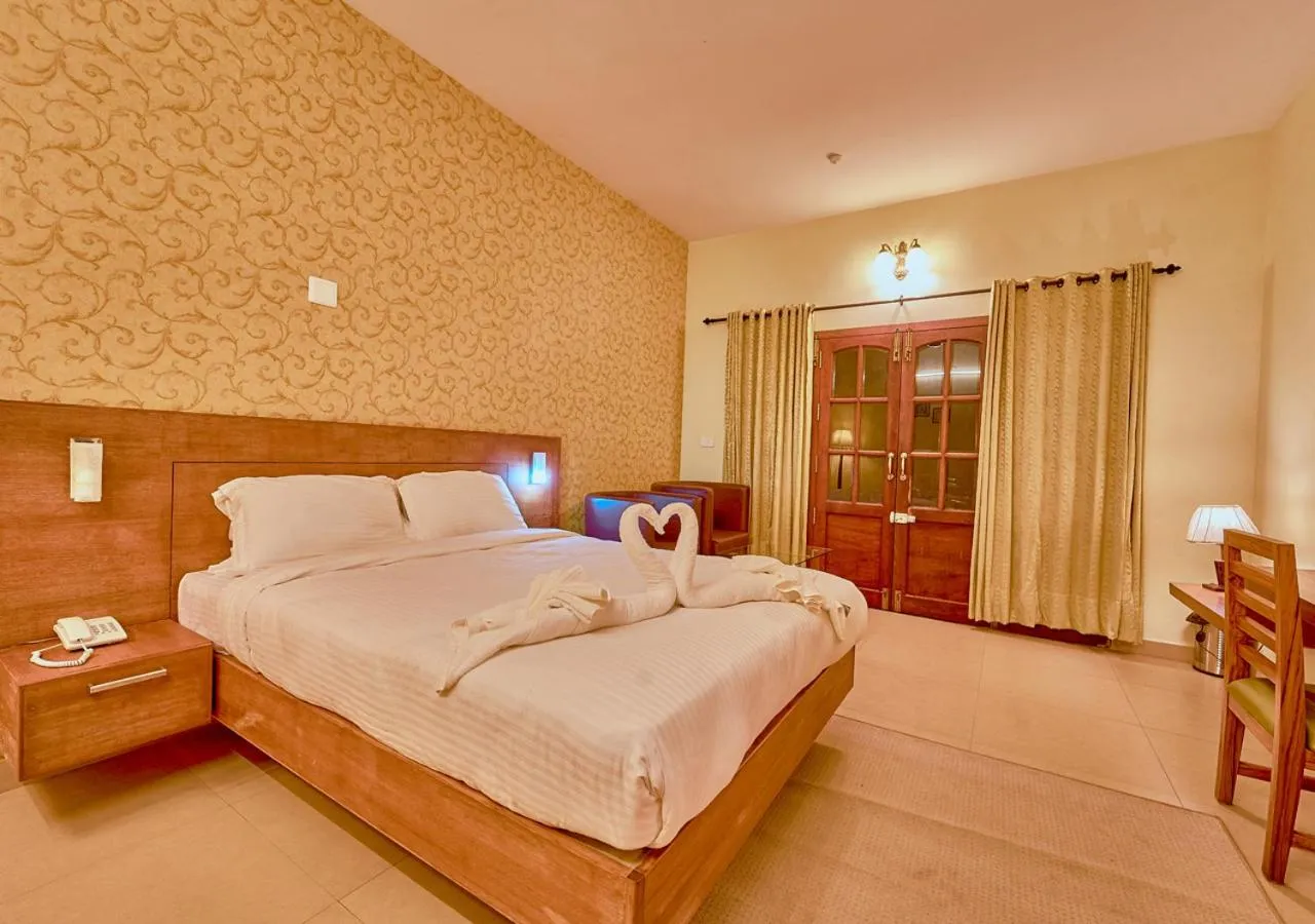 Photo of the whole room, Bed in Ushasree Wayanad Premium Pool Resort by VOYE HOMES
