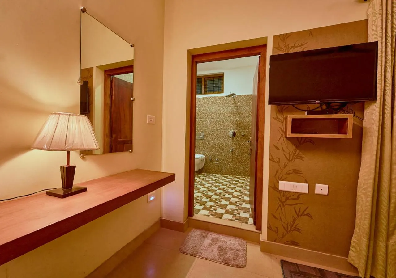 Bathroom in Ushasree Wayanad Premium Pool Resort by VOYE HOMES
