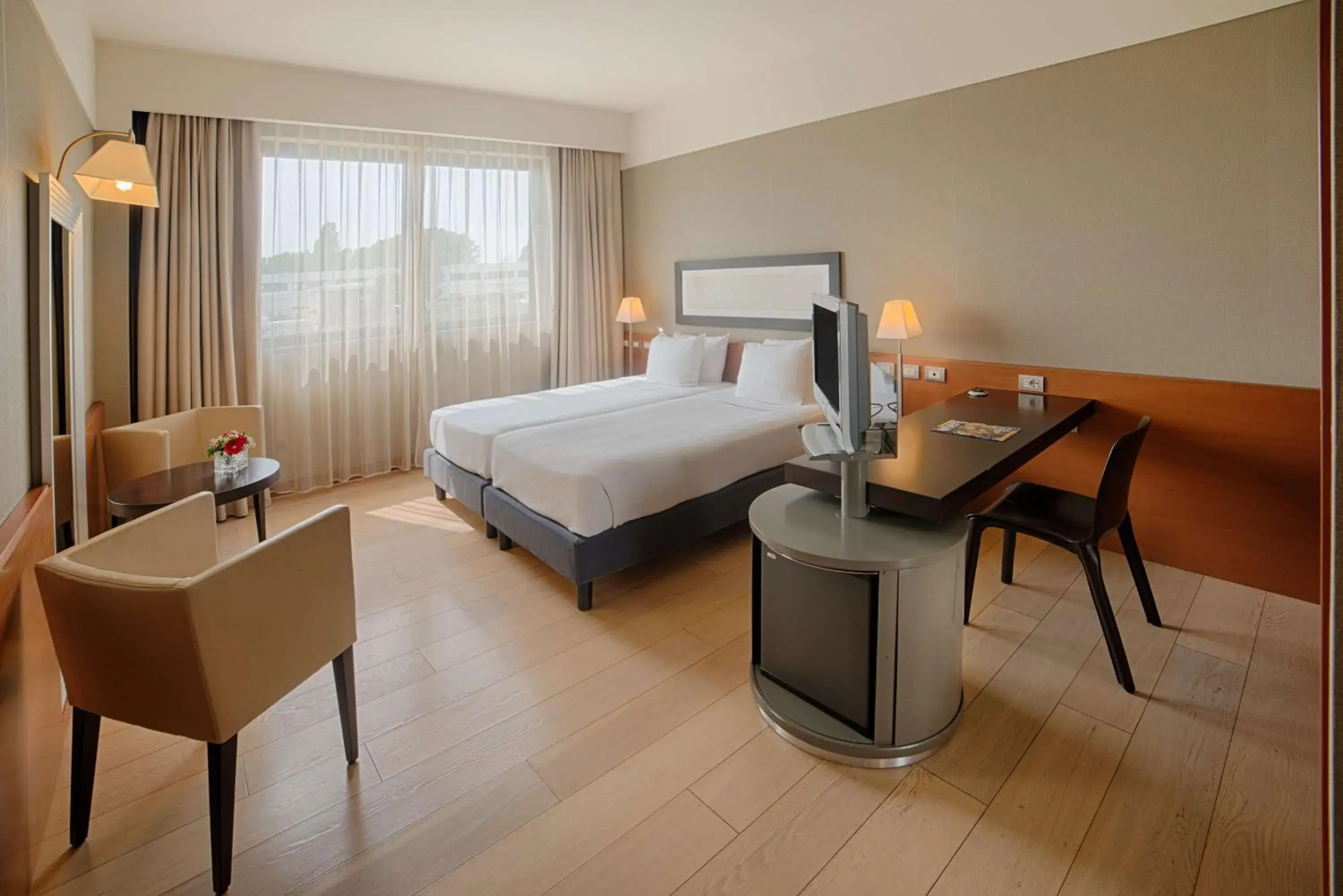 Photo of the whole room, Bed in NH Linate Photo of the whole room, Bed in NH Linate