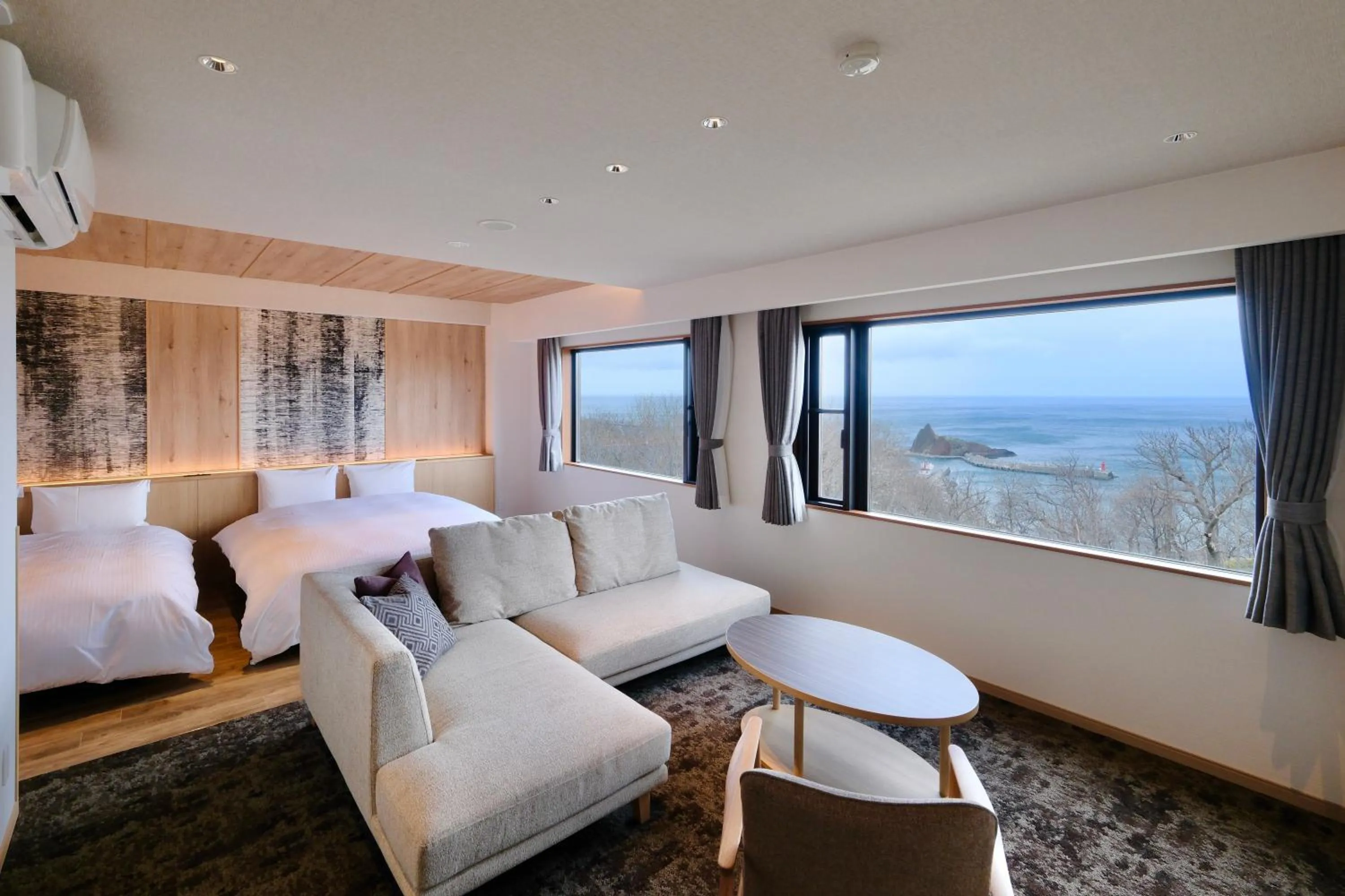 Living room, Bed in Kiki Shiretoko Natural Resort