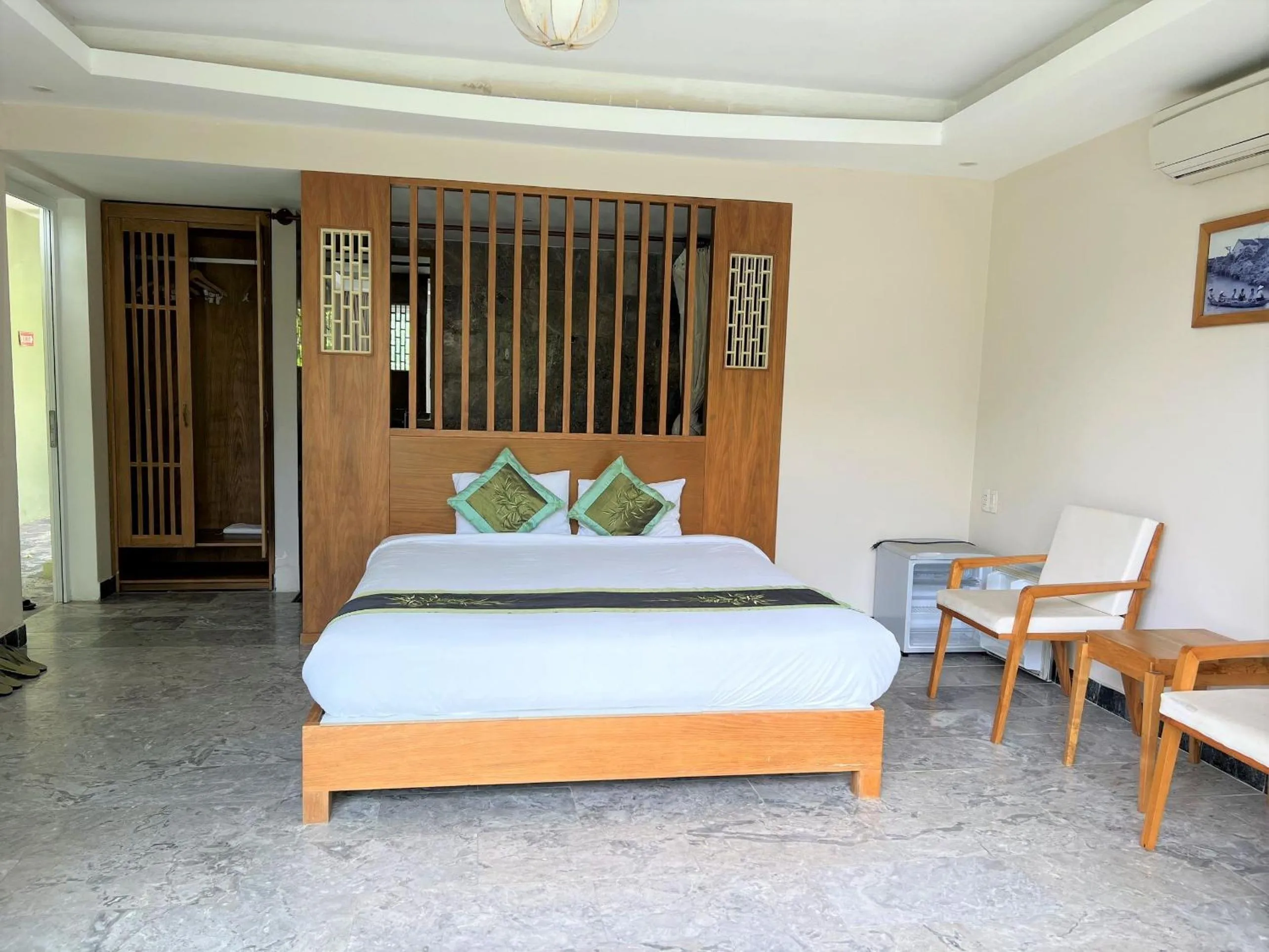 Bed in Jolie Villa Hoi An