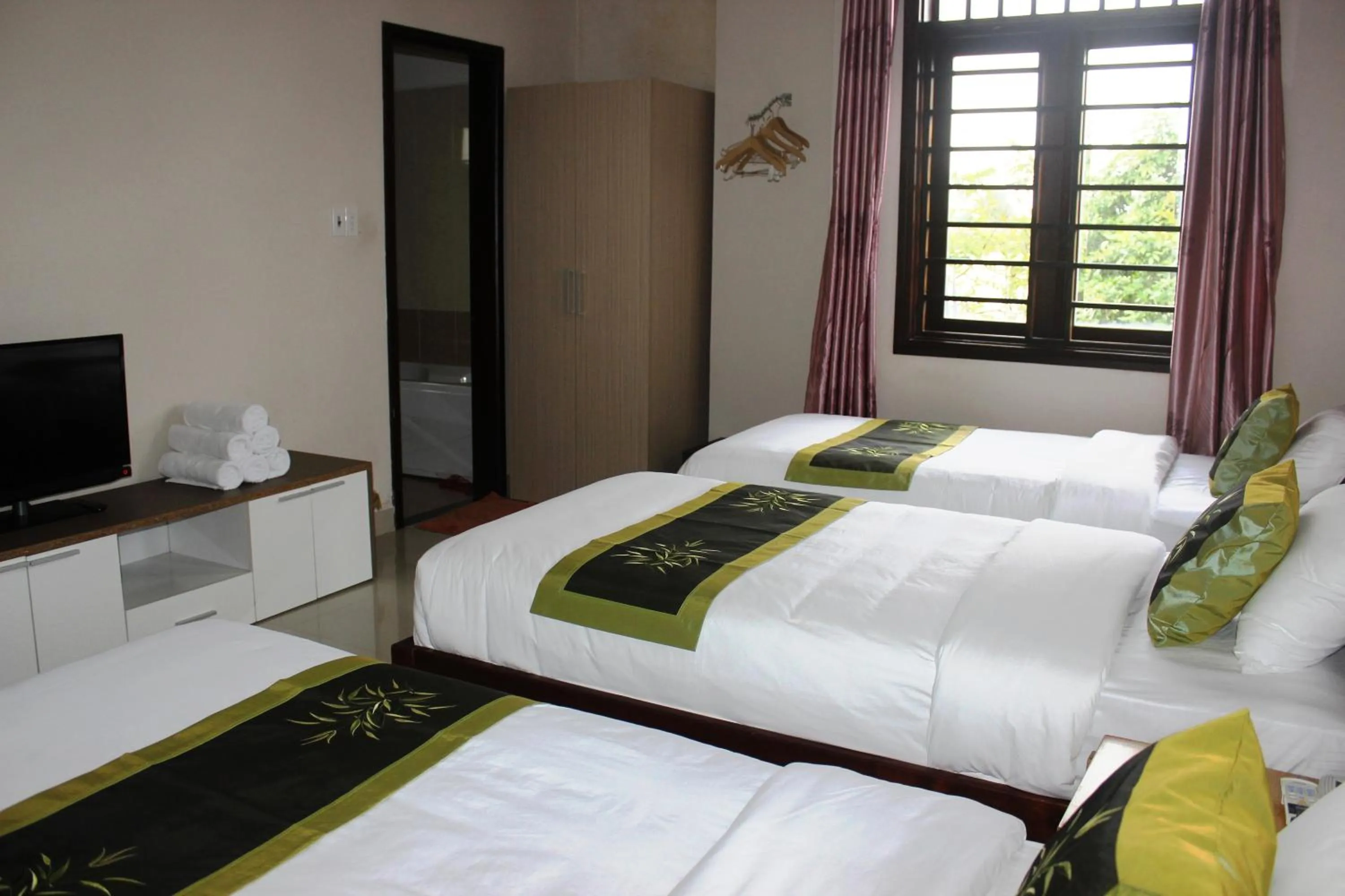 Photo of the whole room, Bed in Jolie Villa Hoi An
