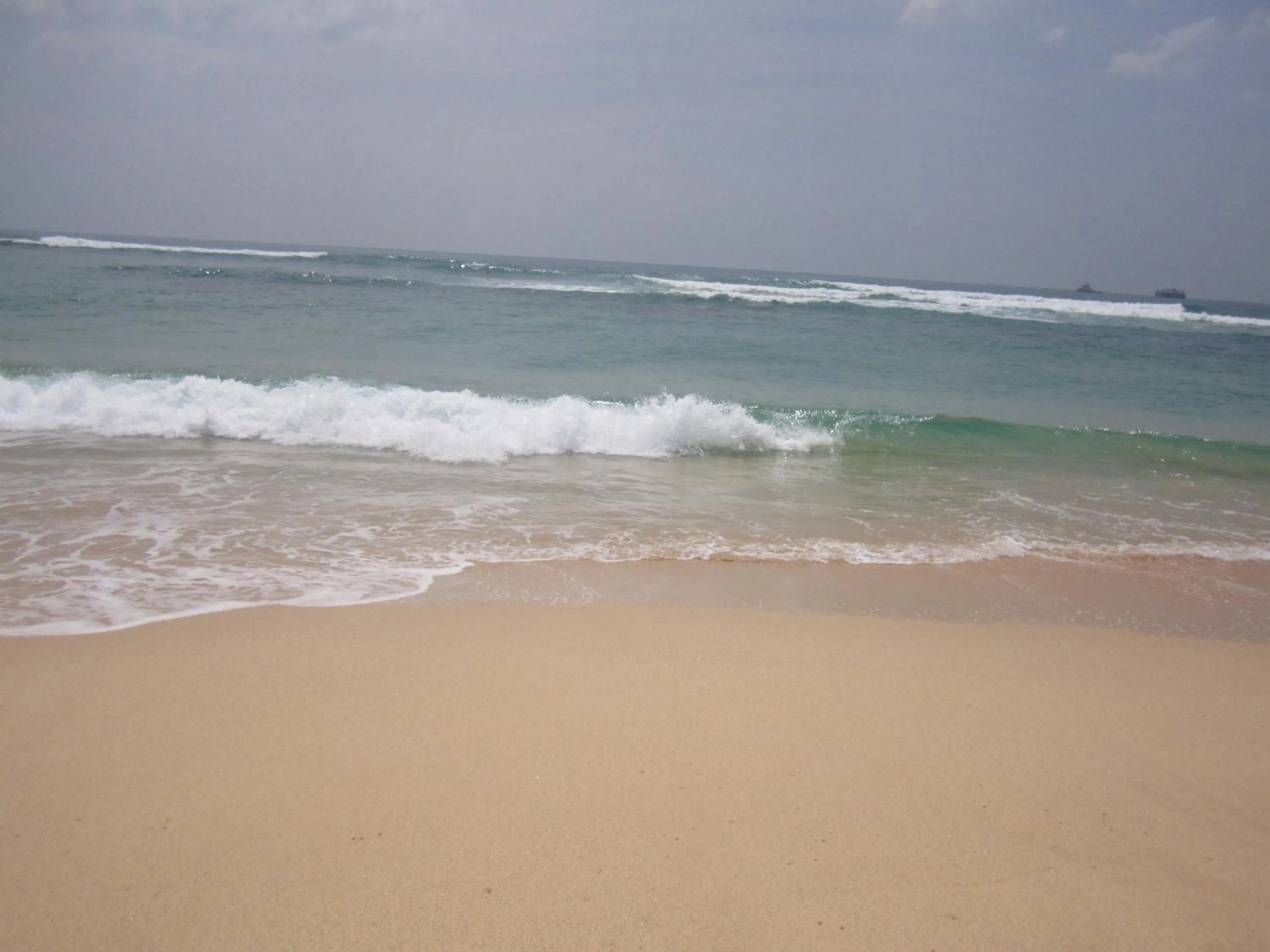 Day in White Surfing Beach Resort