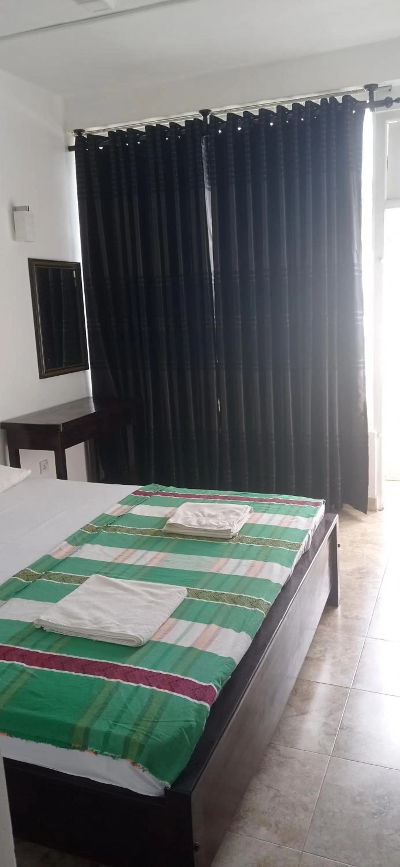 Bed in White Surfing Beach Resort