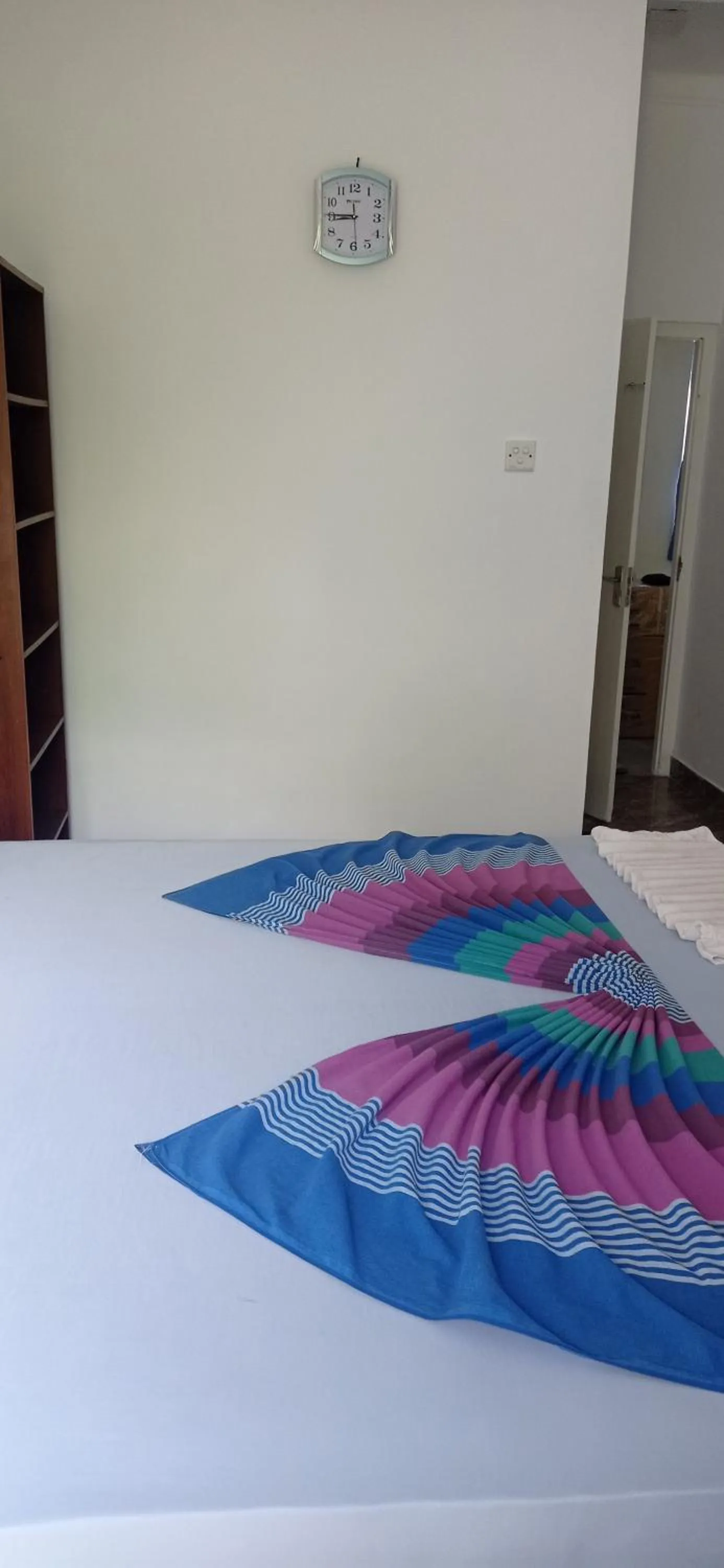 Bed in White Surfing Beach Resort