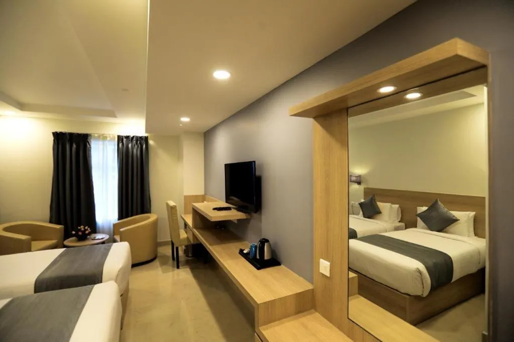 Photo of the whole room, Bed in PP Residency