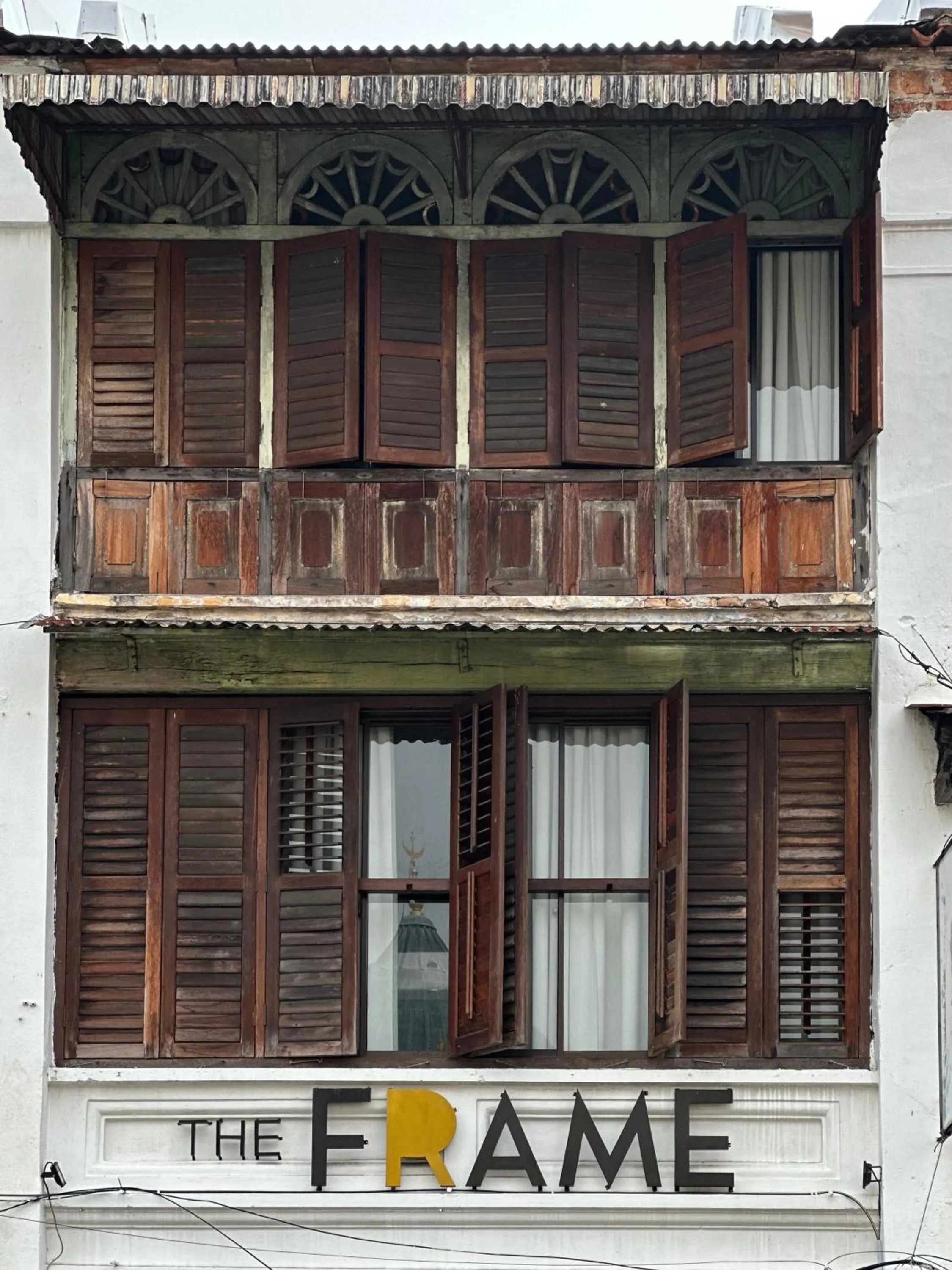 Property building in The Frame Guesthouse