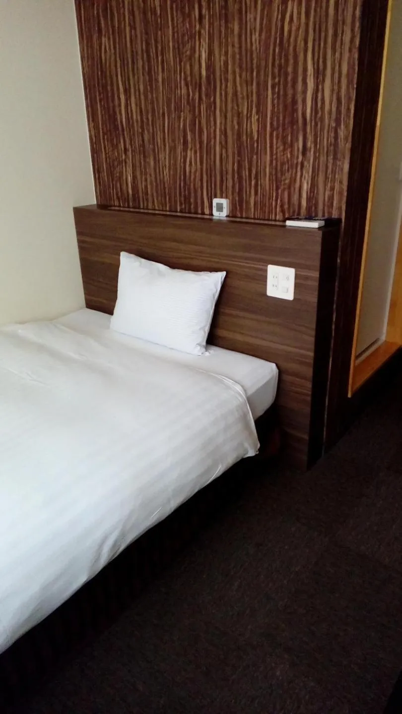 Bed in Business Hotel Atelier